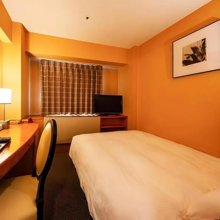 Bed in Diamond Hotel Tokyo