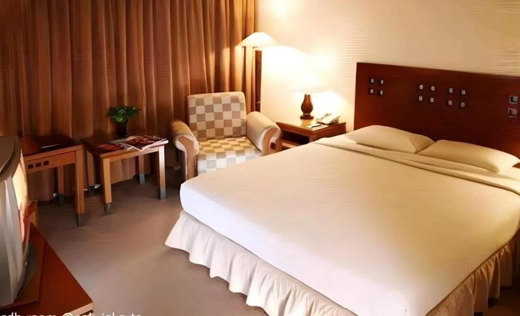 Bed in Oasis Amir Hotel