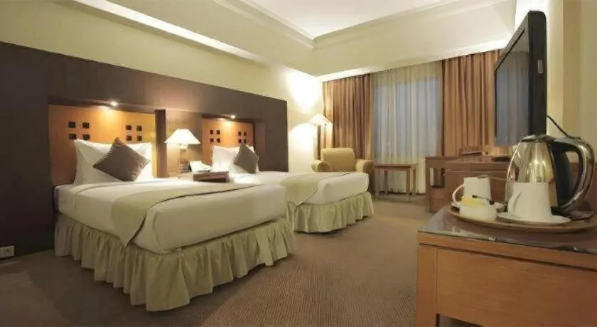 Bed in Oasis Amir Hotel