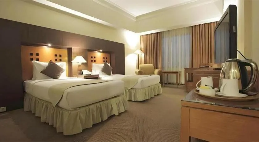 Bed in Oasis Amir Hotel