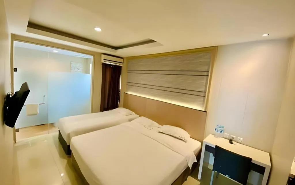 Bed in Sumi Hotel Simpang Lima Semarang