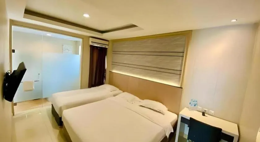 Bed in Sumi Hotel Simpang Lima Semarang