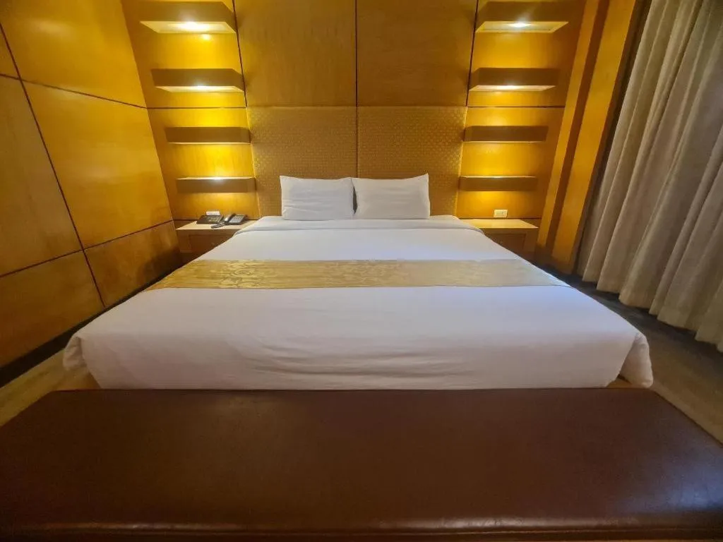 Bed in Western Grand Hotel Ratchaburi