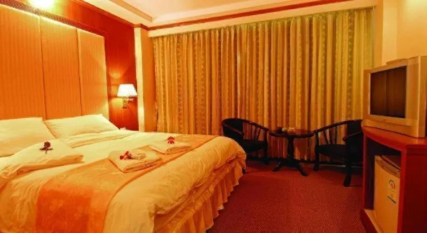 Bed in Western Grand Hotel Ratchaburi