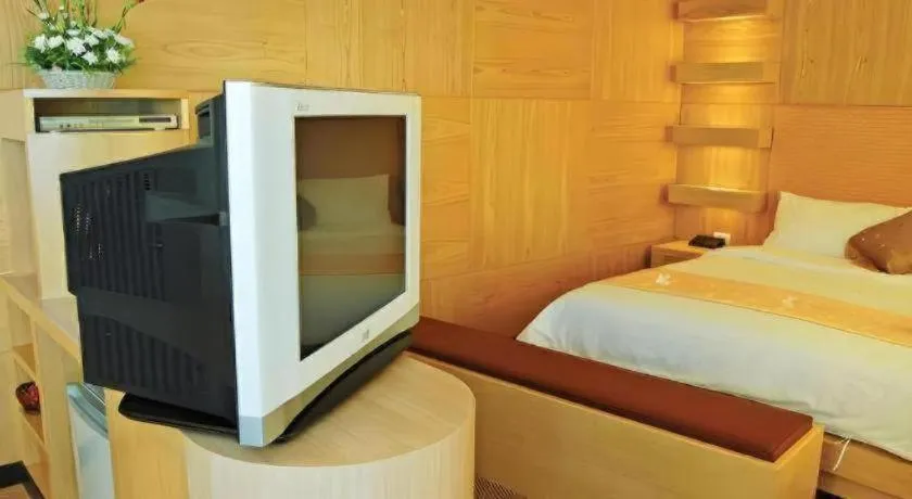 Bed in Western Grand Hotel Ratchaburi