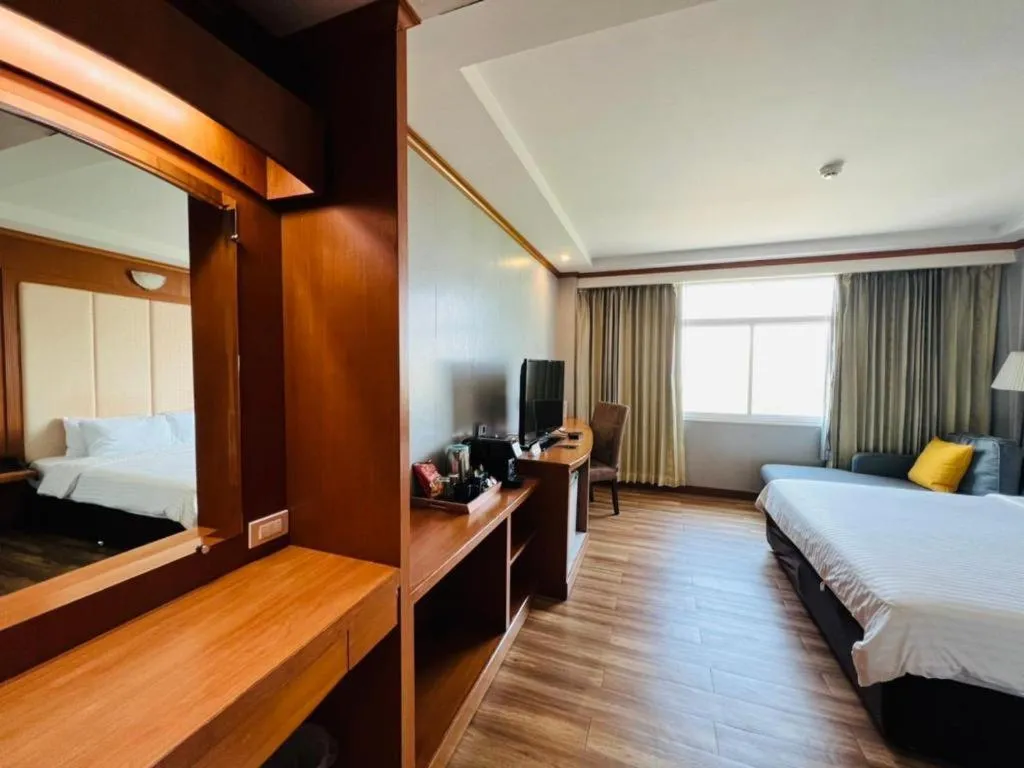 Bed in Western Grand Hotel Ratchaburi