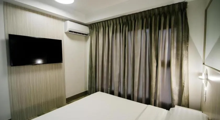 Bed in Travelite Express Hotel