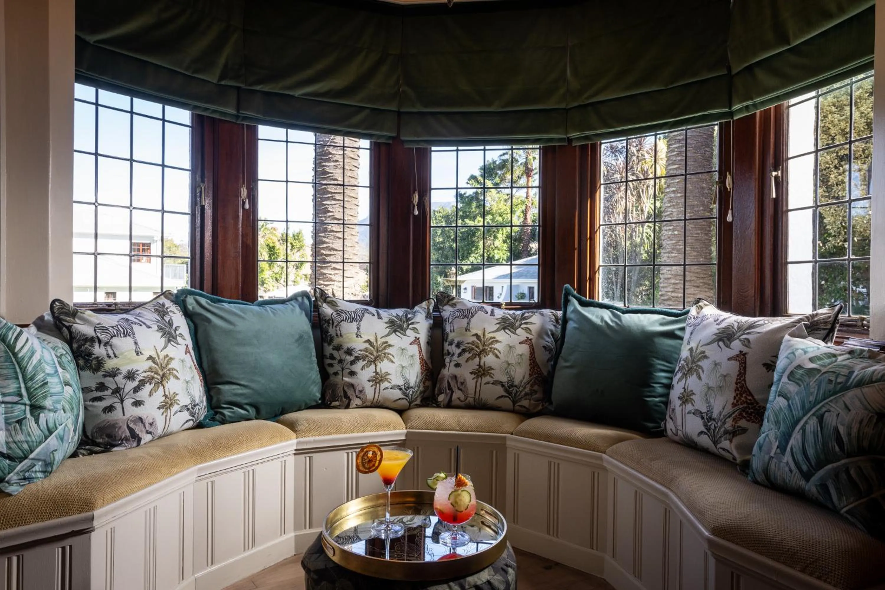 Communal lounge/ TV room in Palm House Boutique Hotel and Spa