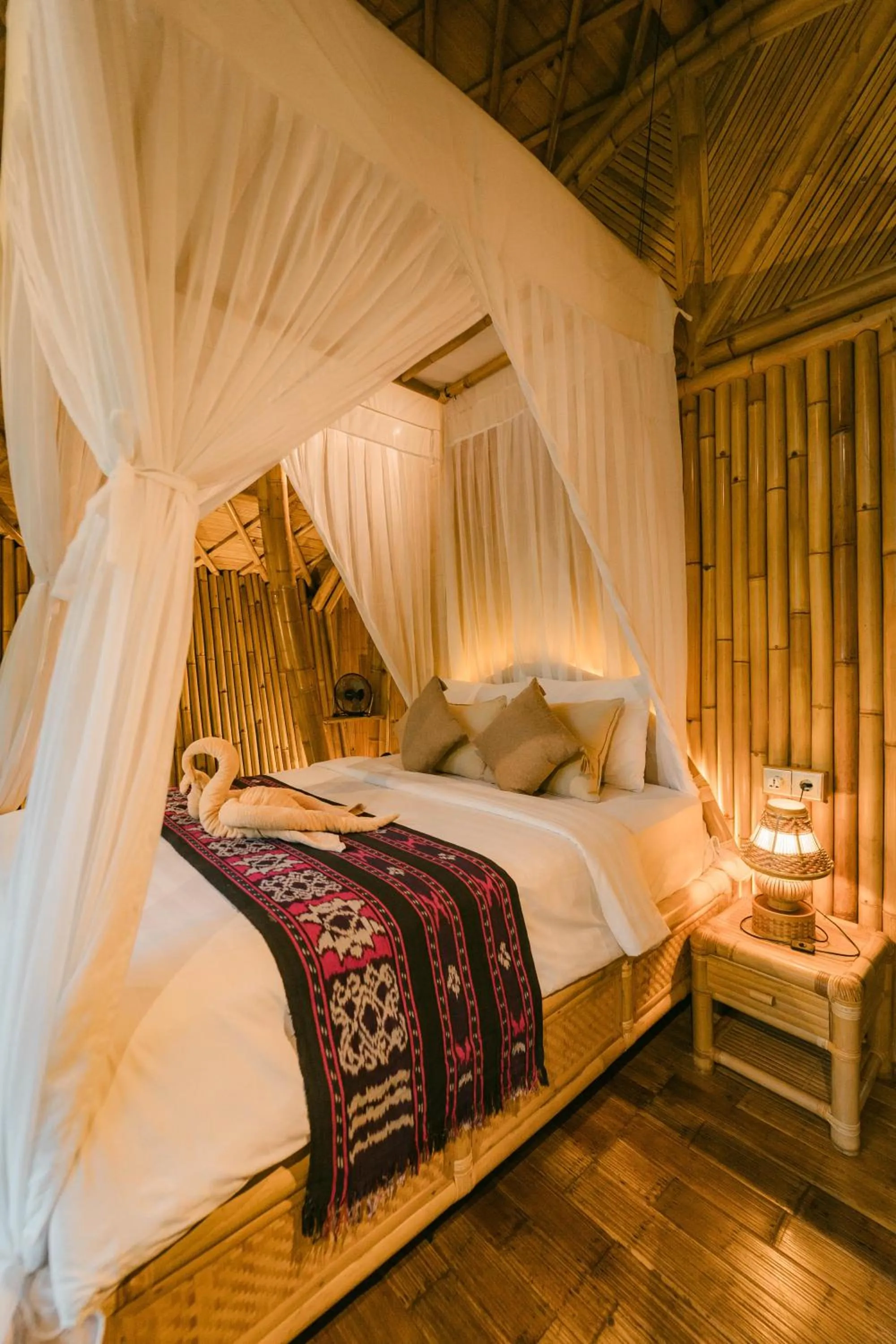 Bed in Arcada Bali Bamboo House