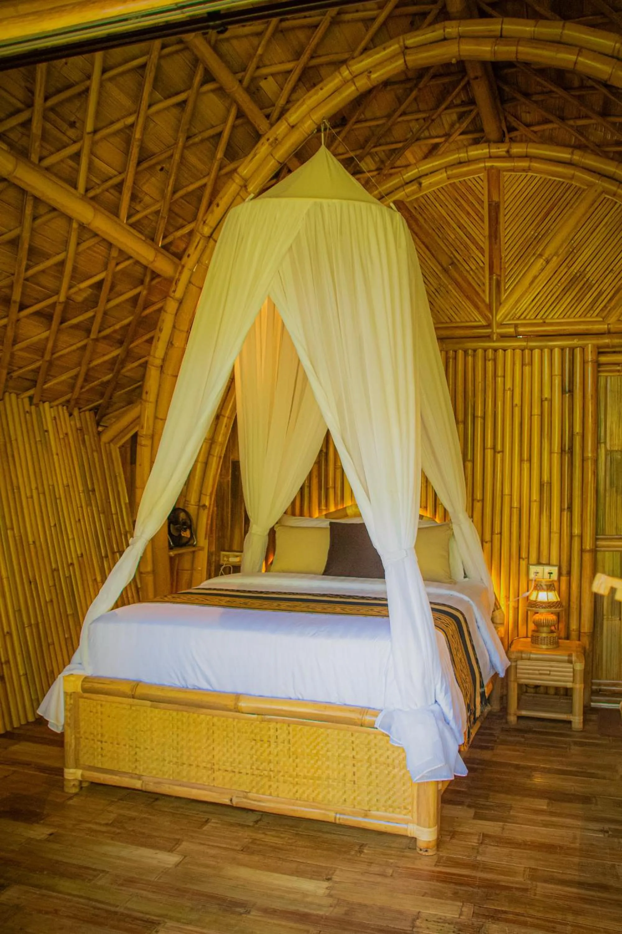 Bed in Arcada Bali Bamboo House