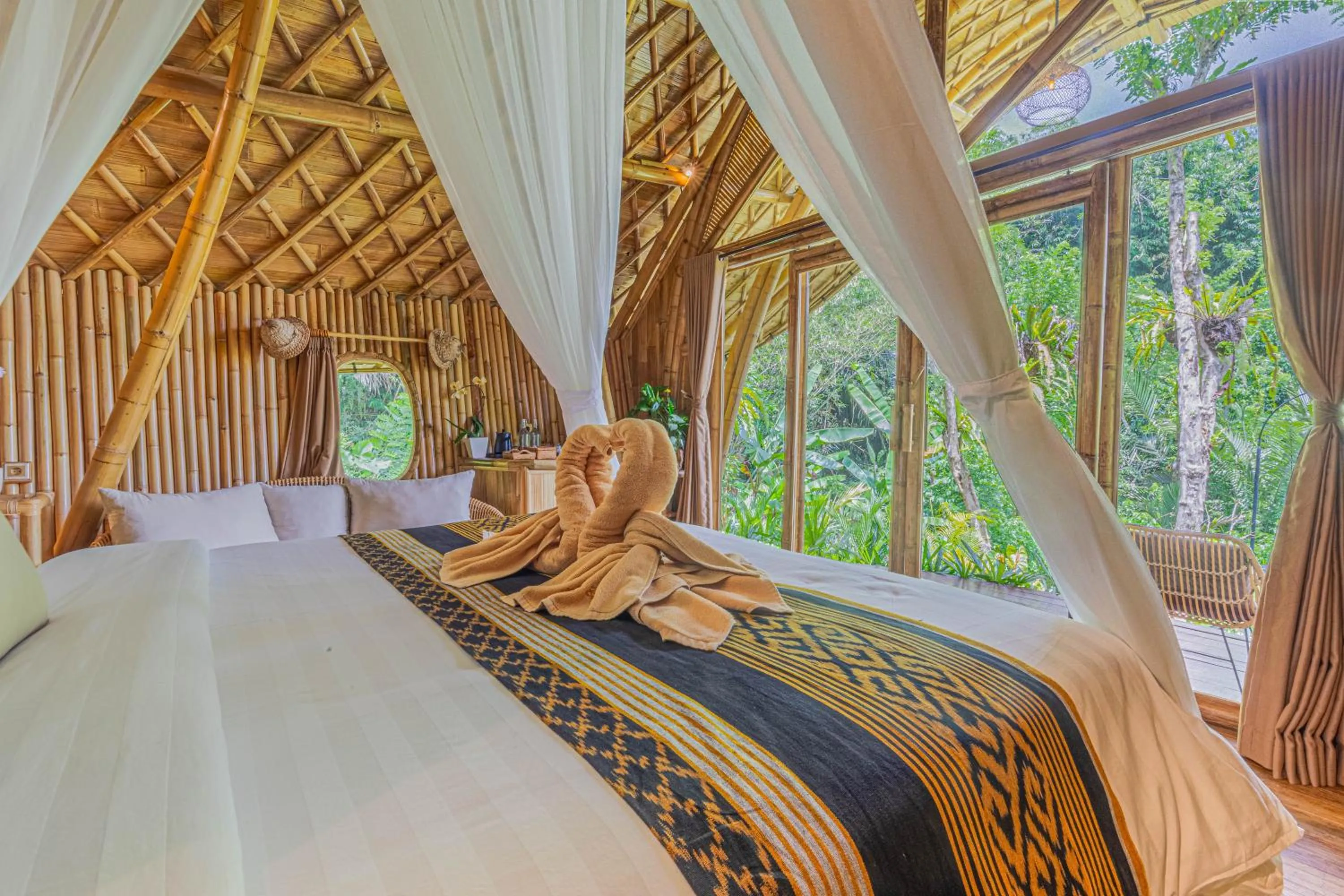 Bed in Arcada Bali Bamboo House