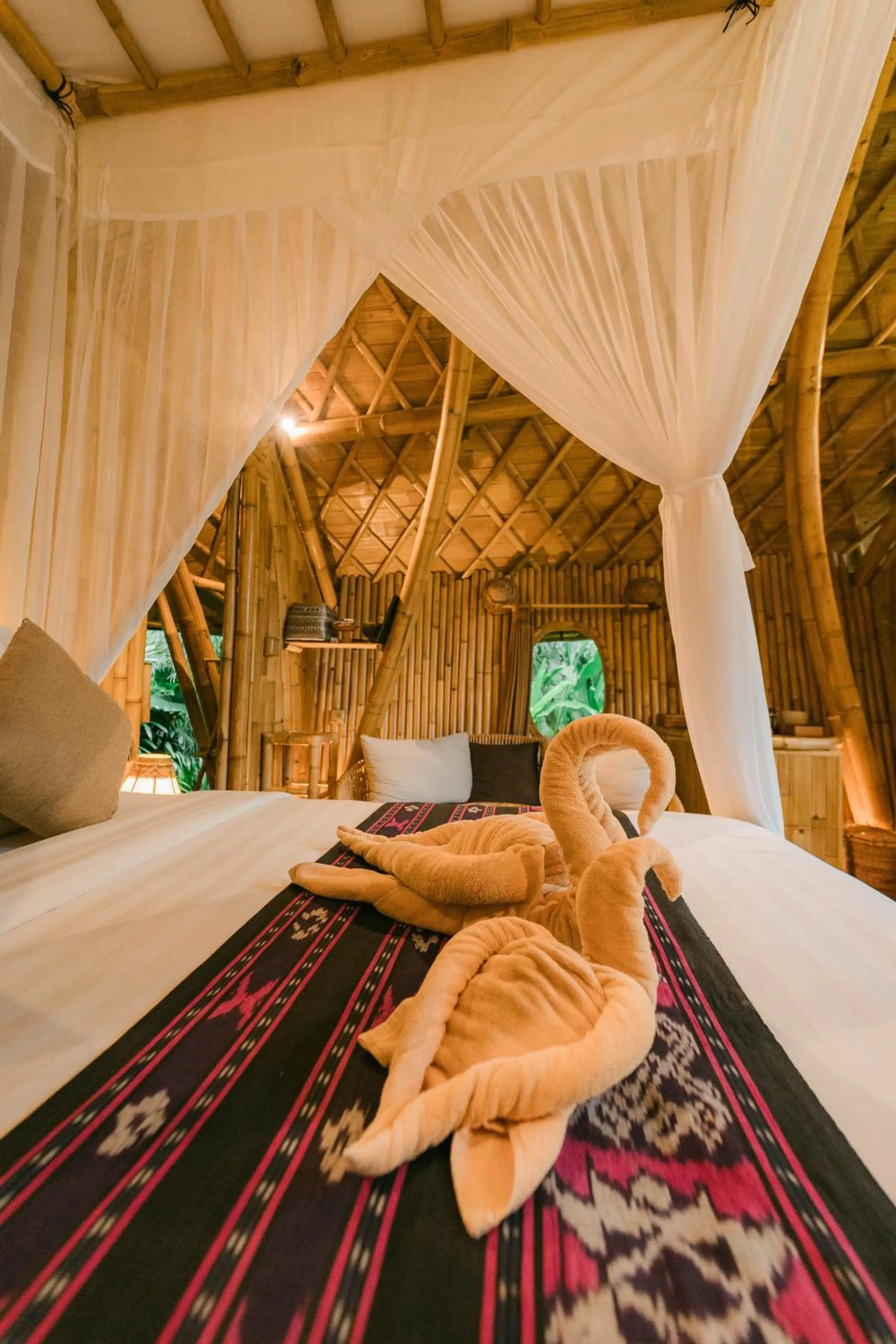 Bed in Arcada Bali Bamboo House