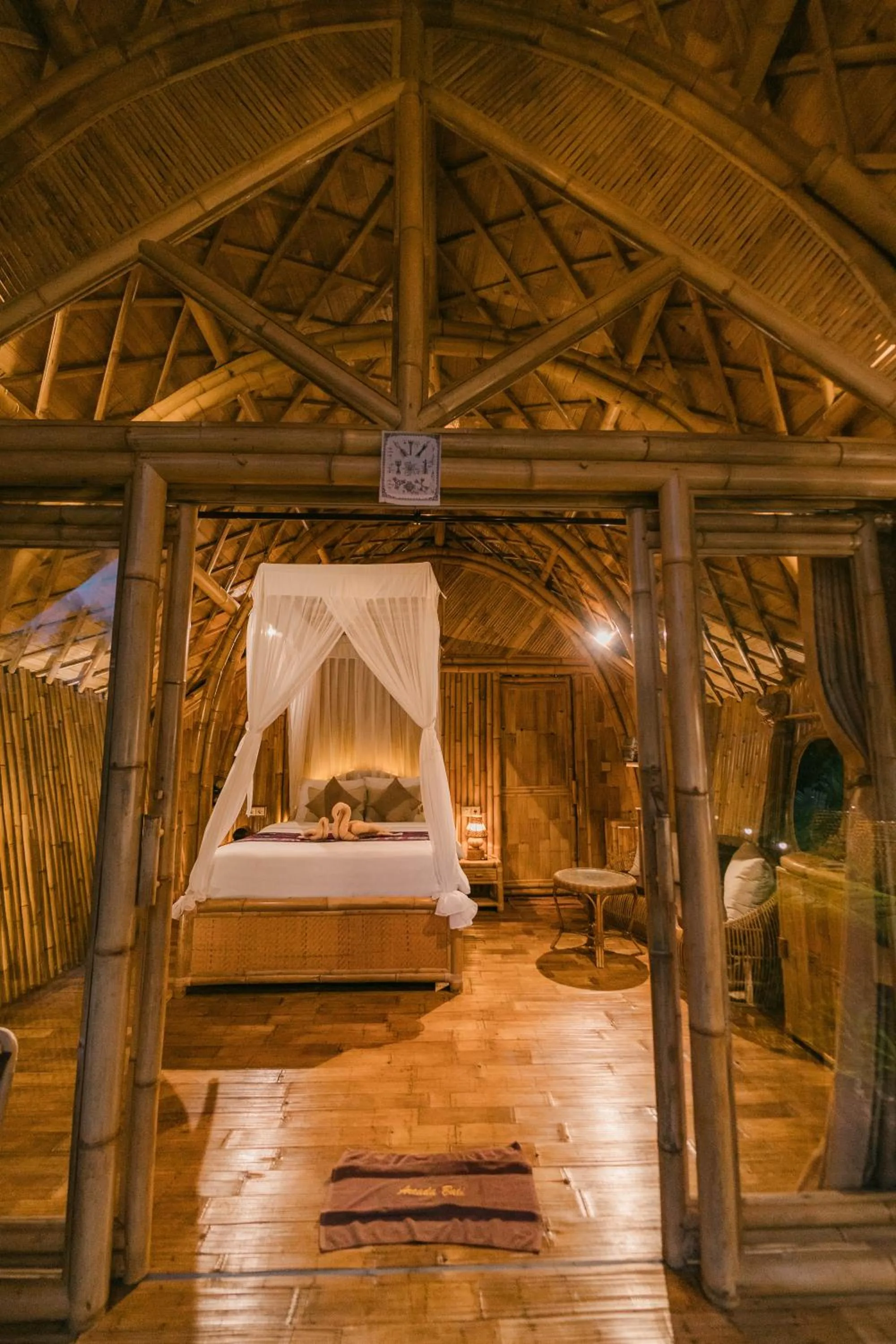 Bed in Arcada Bali Bamboo House