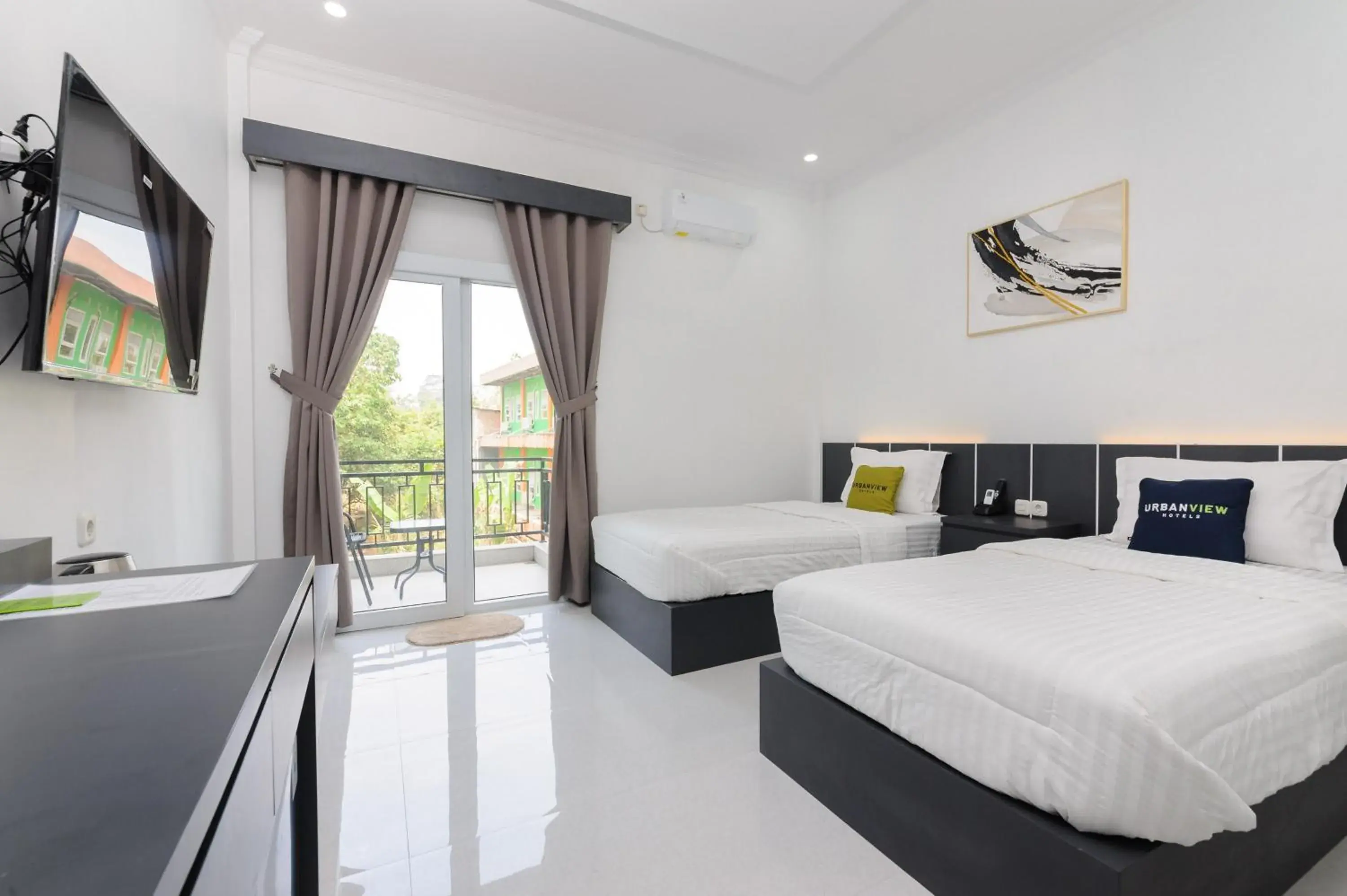 Twin Room in Urbanview Hotel AnD Lampung by RedDoorz Twin Room in Urbanview Hotel AnD Lampung by RedDoorz