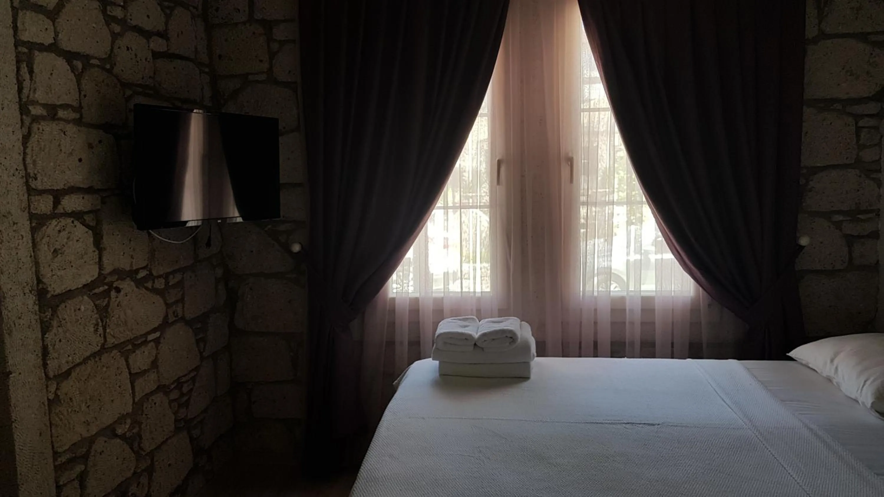 Bed in Alacati Alaris Hotel