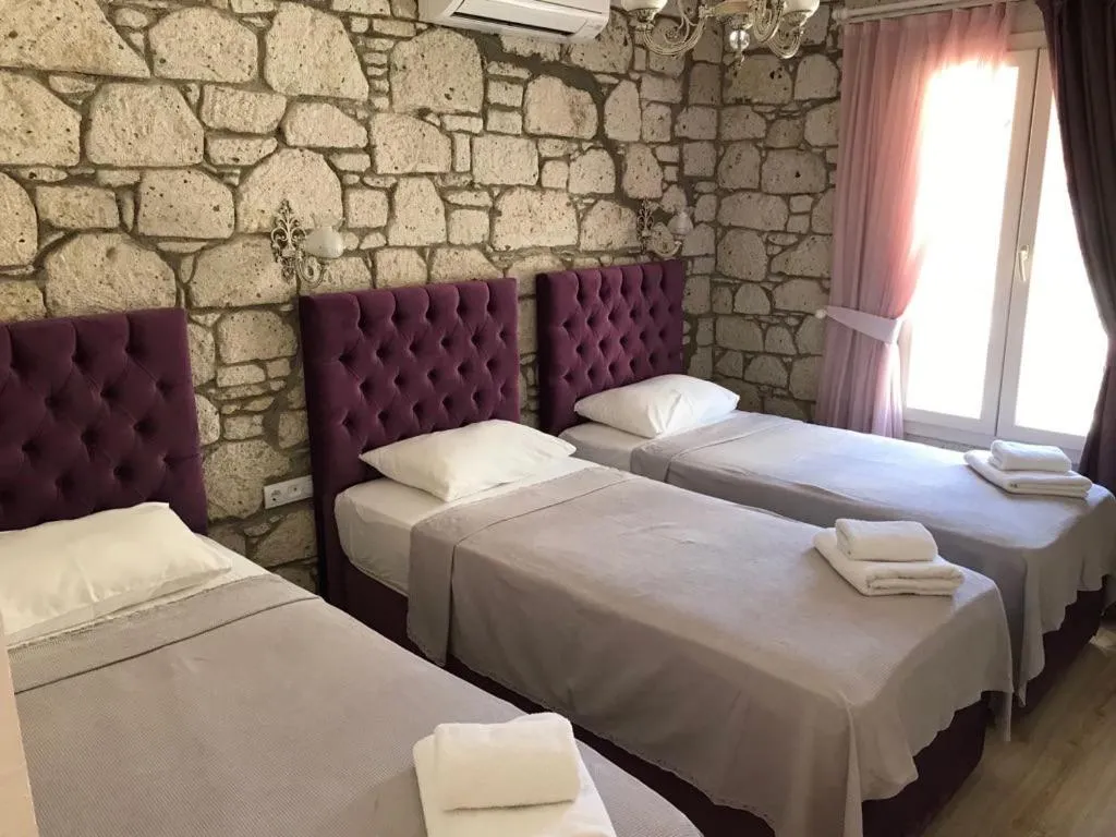 Bed in Alacati Alaris Hotel