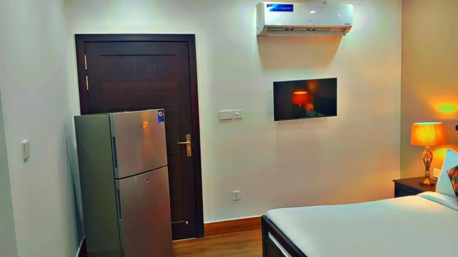 Bed in Gulberg Suites