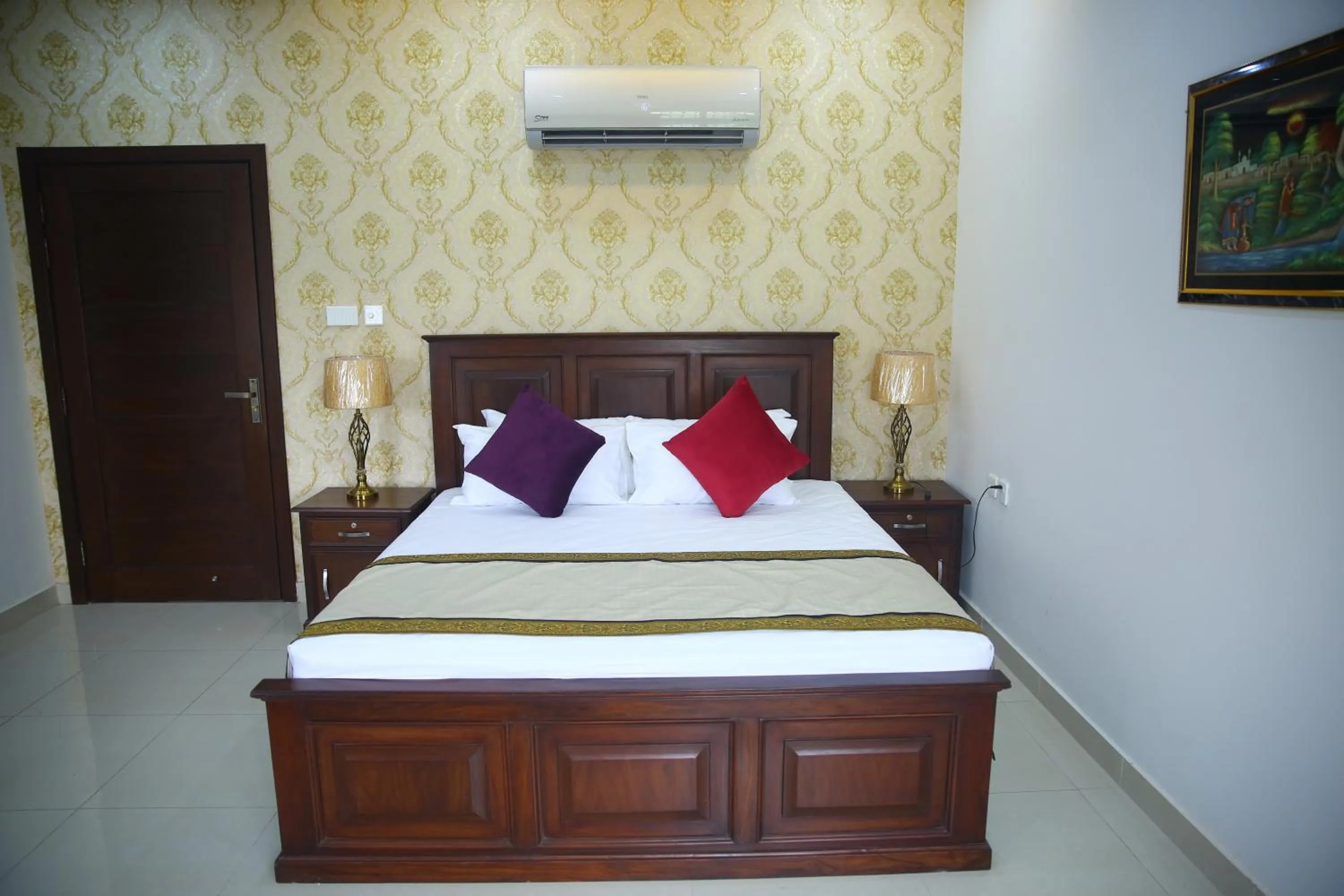 Bed in Gulberg Suites