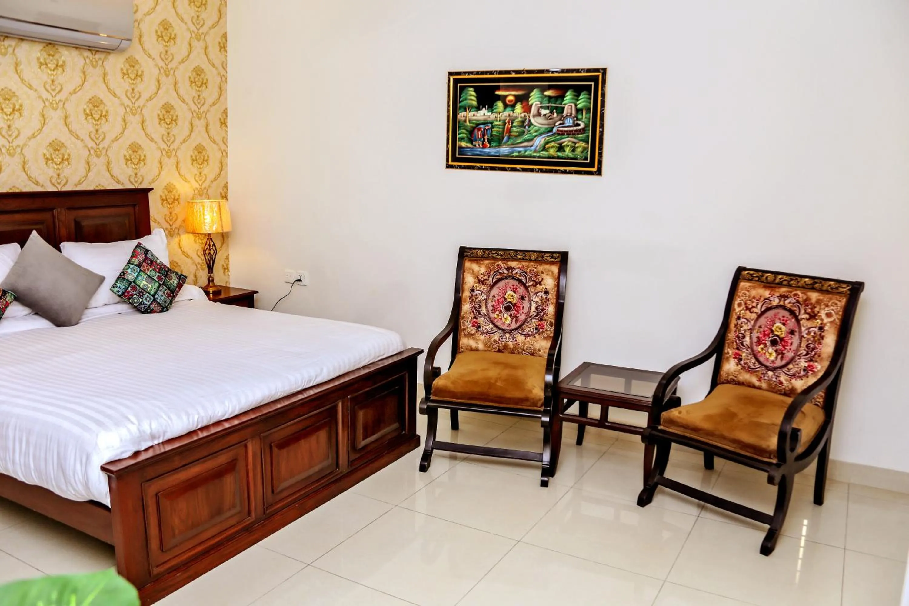 Photo of the whole room, Bed in Gulberg Suites