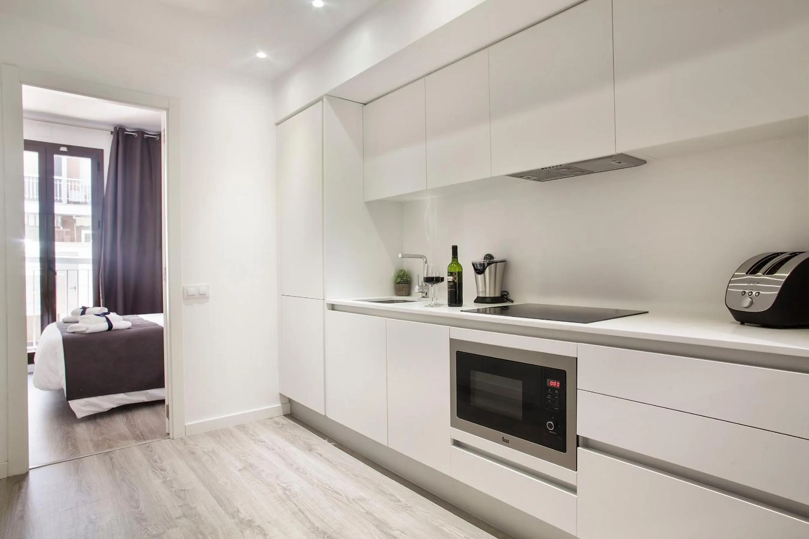 Kitchen or kitchenette in Habitat Apartments ADN