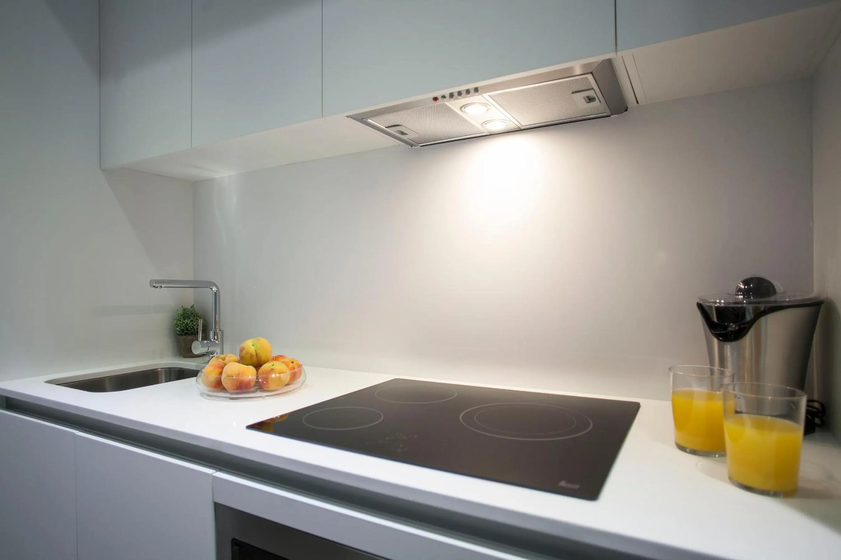 Kitchen or kitchenette in Habitat Apartments ADN