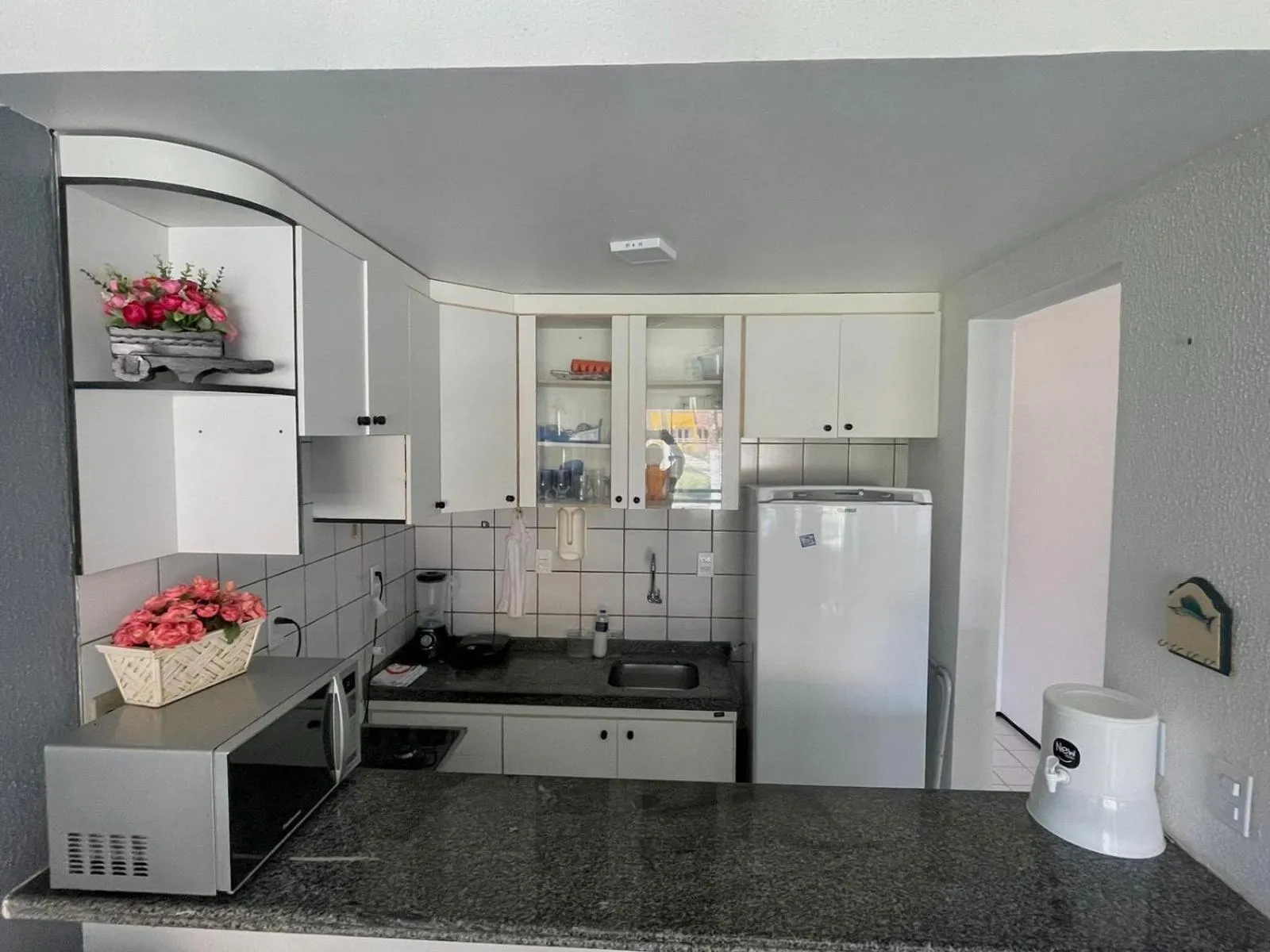 Kitchen or kitchenette in Village Cartier Beach
