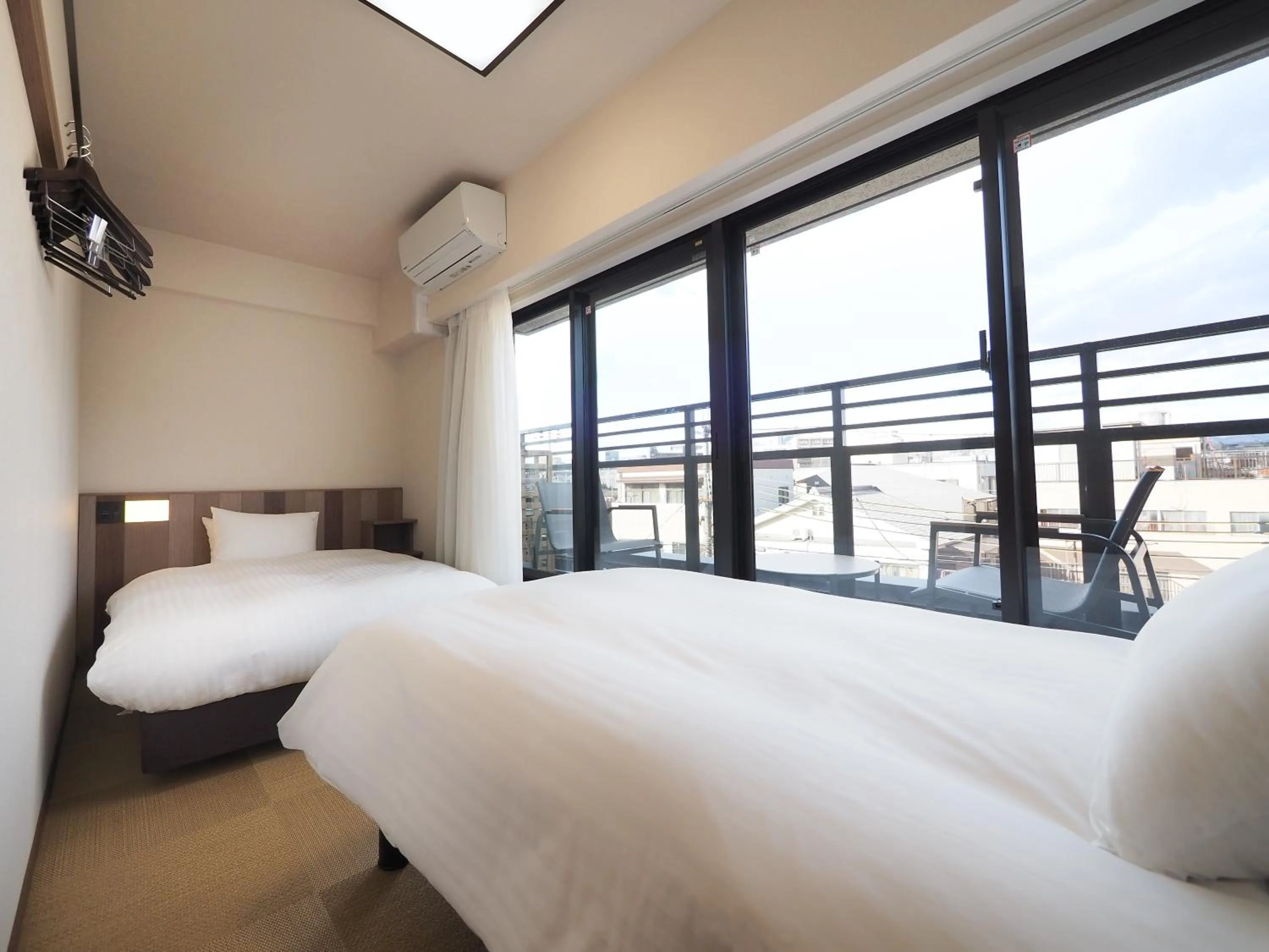 Bed in HIYORI Stay Kyoto Kamogawa