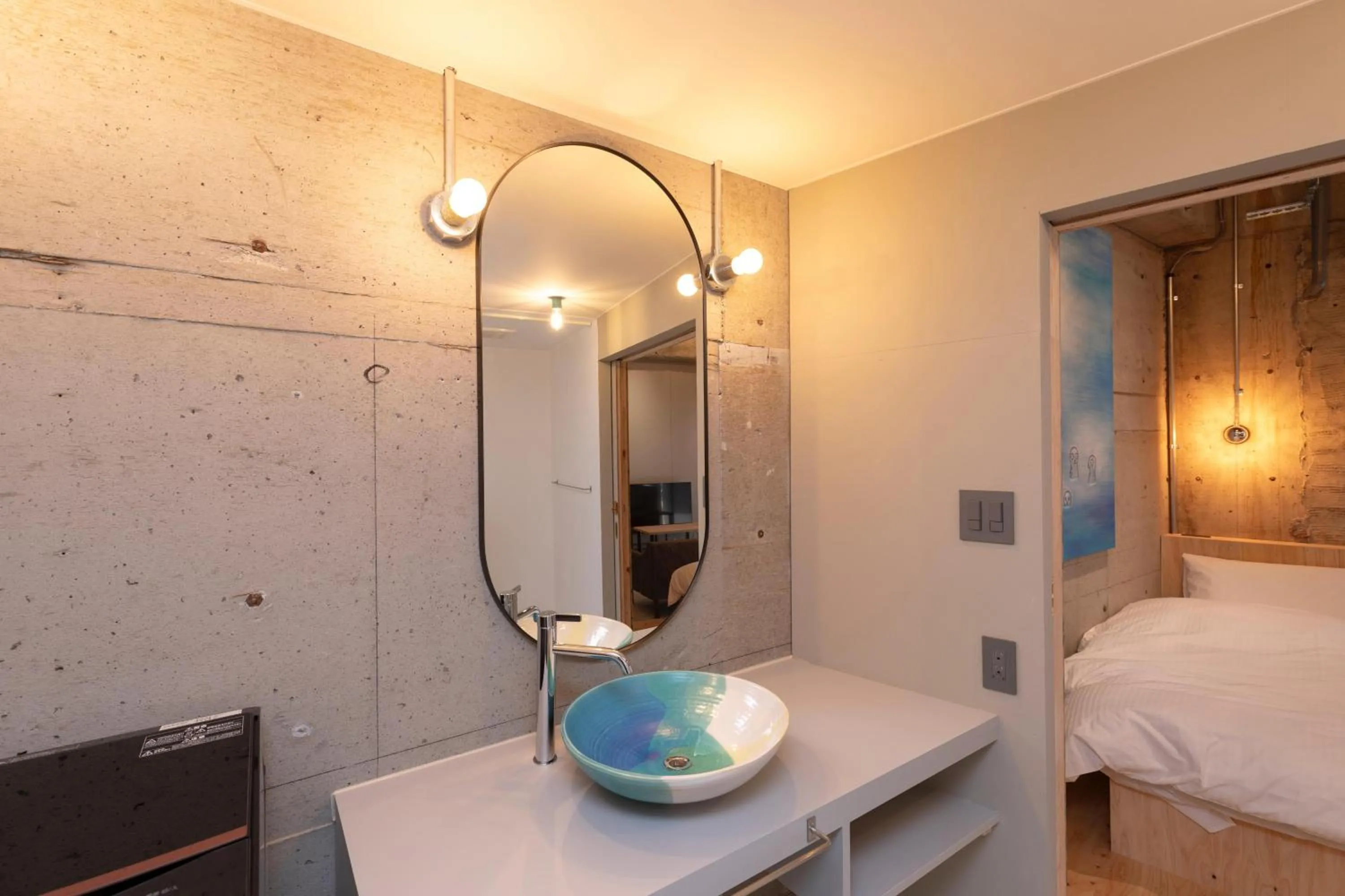 Bed in HAJIMARI Beppu