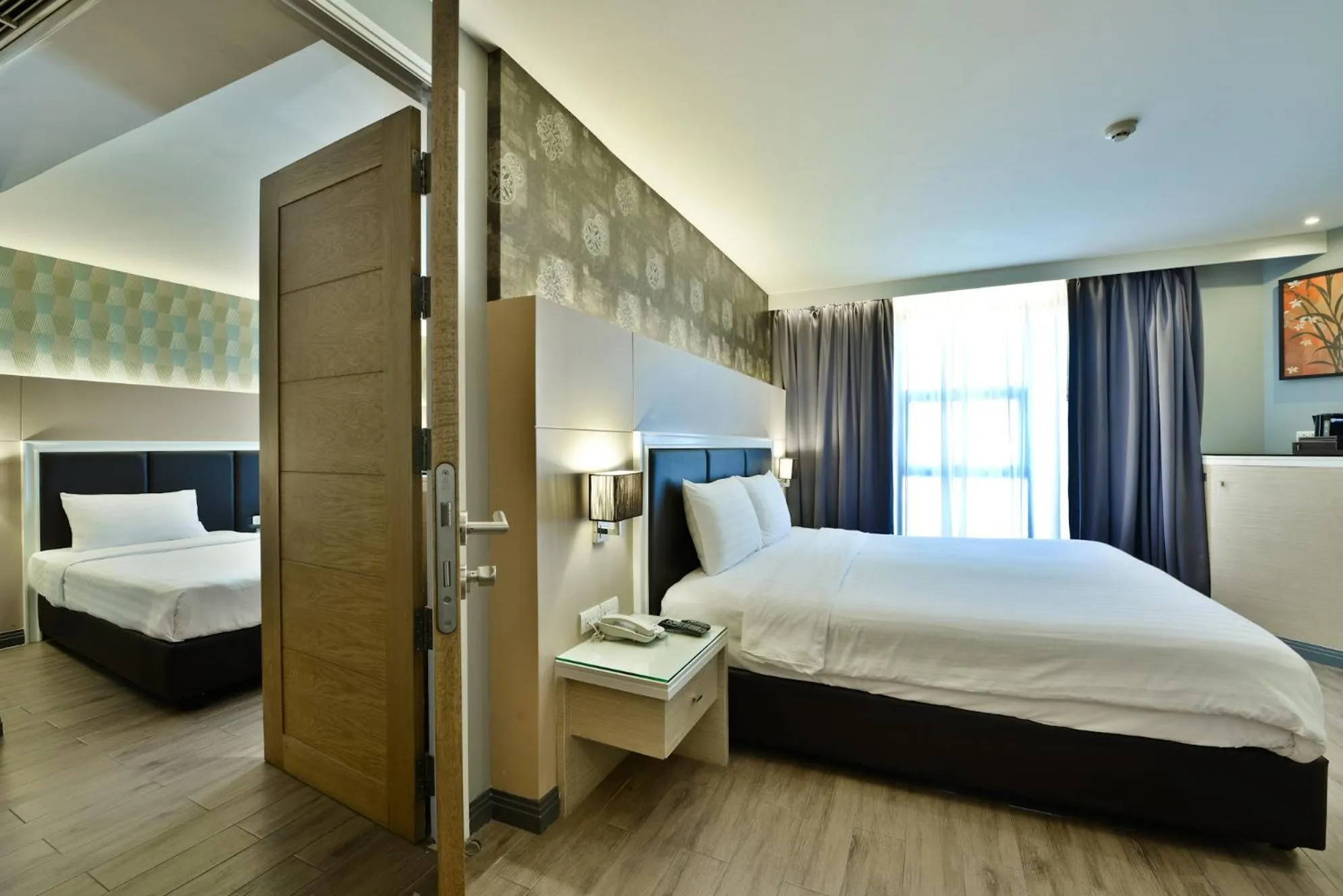 Photo of the whole room, Bed in Prestige Suites Nana