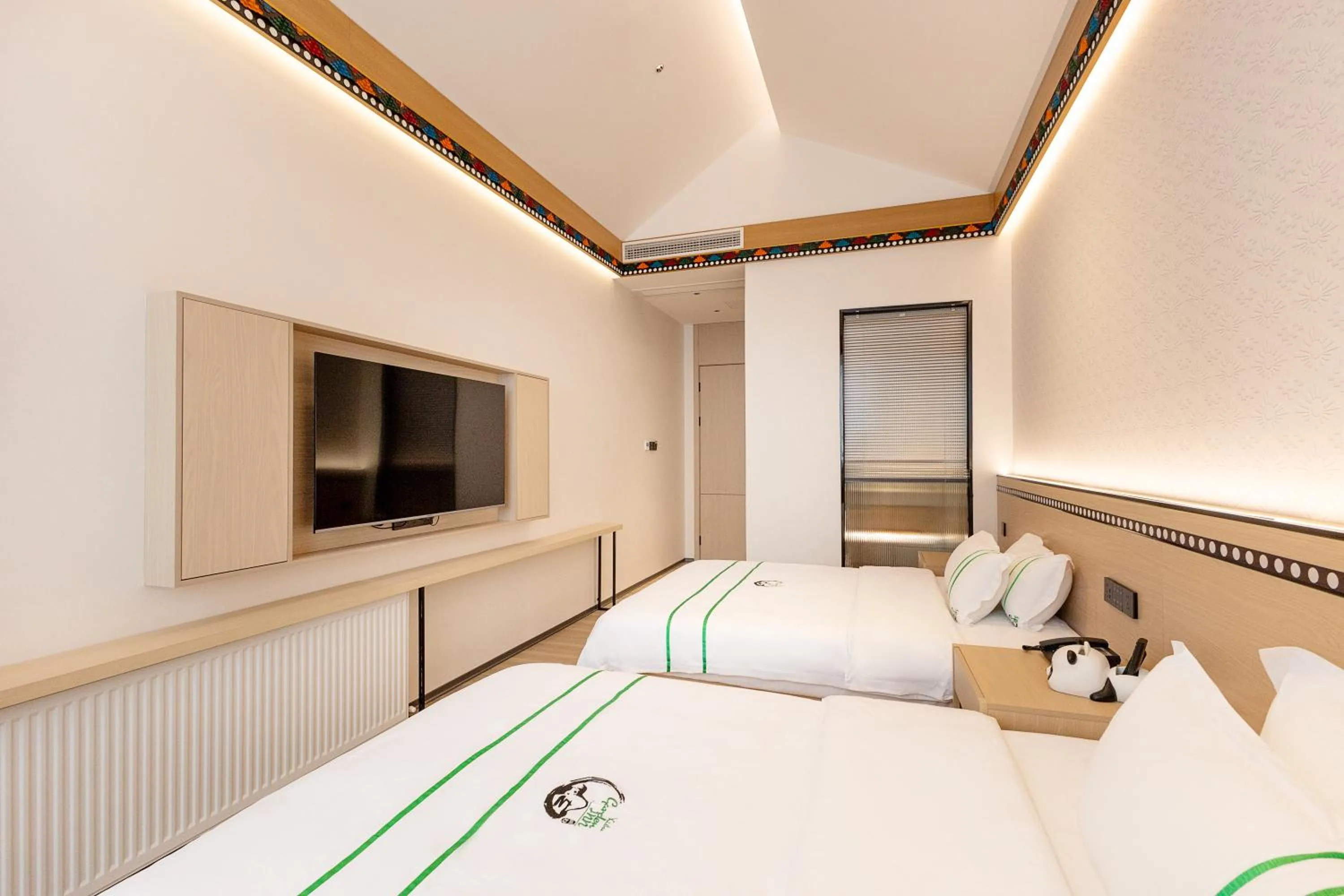 Bed in Xishu Garden Inn - Travel Agency service - Car Rent service - English Speaking