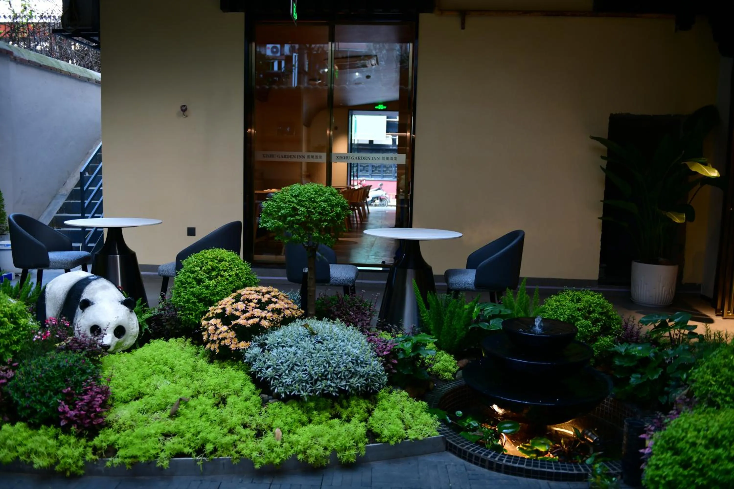 Garden in Xishu Garden Inn - Travel Agency service - Car Rent service - English Speaking