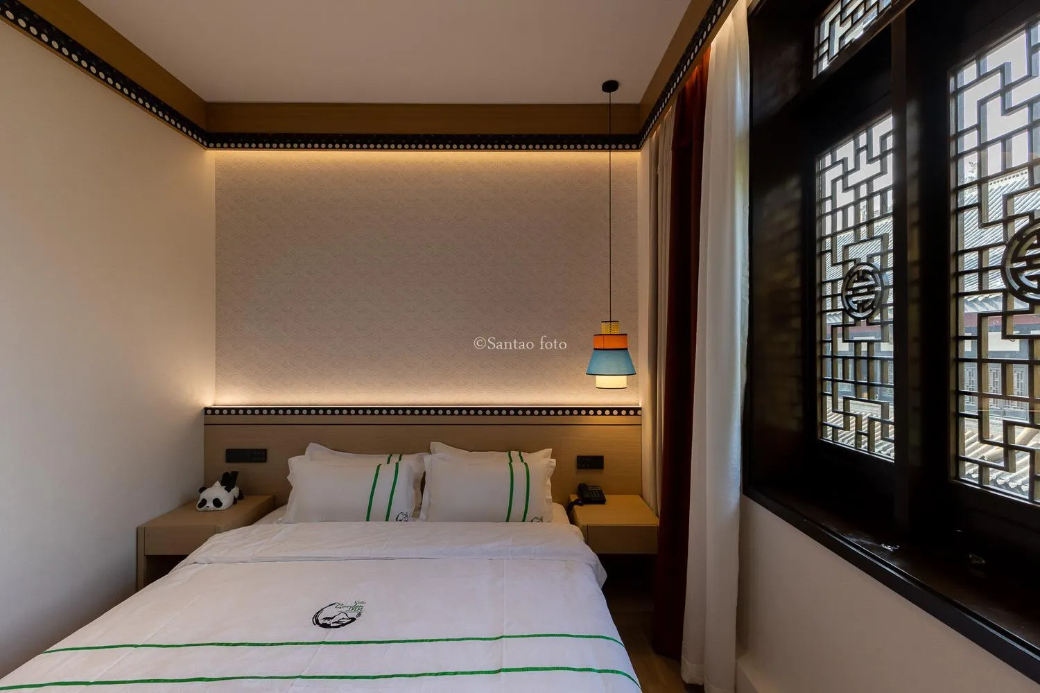 Bedroom, Bed in Xishu Garden Inn - Travel Agency service - Car Rent service - English Speaking