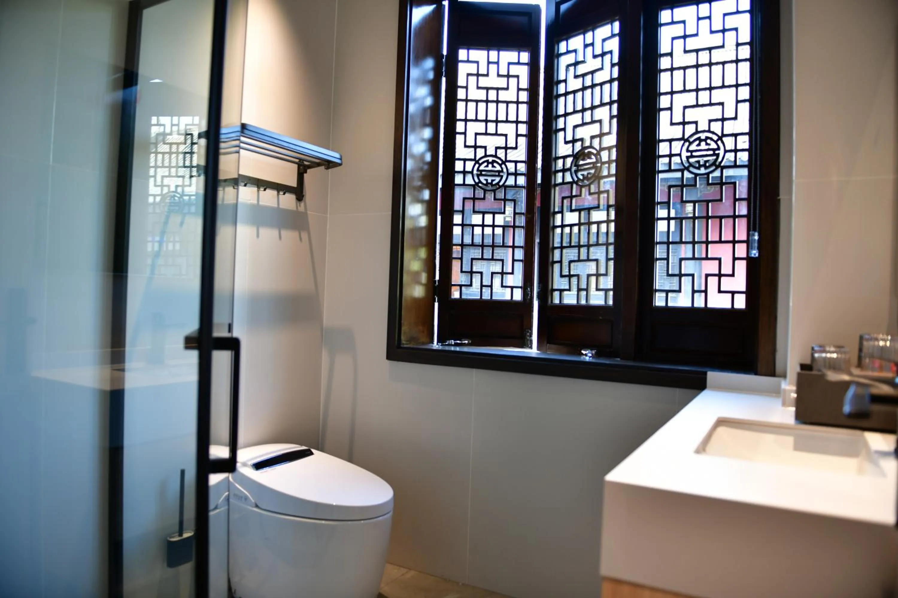 Shower in Xishu Garden Inn - Travel Agency service - Car Rent service - English Speaking