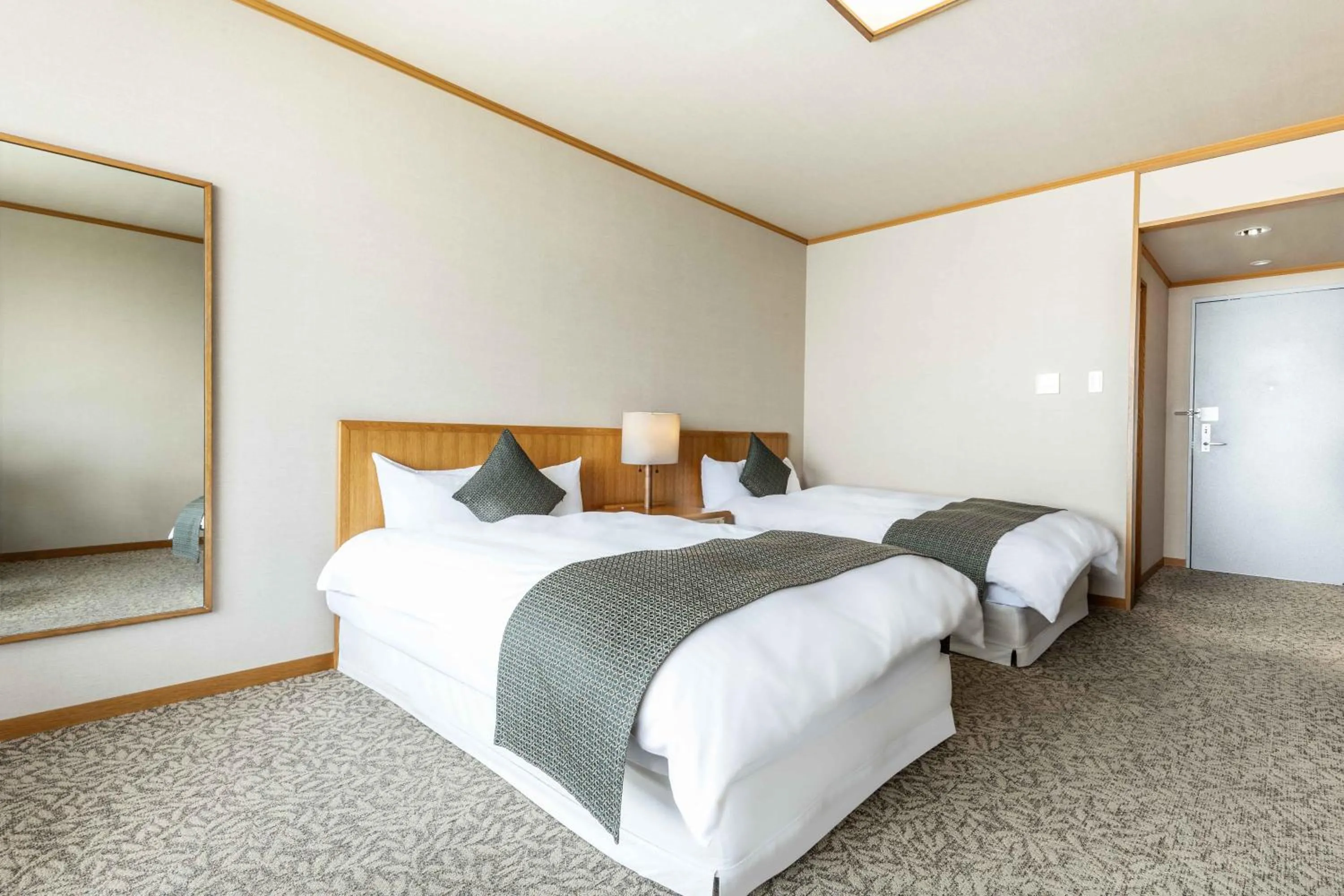 Bed in Spa and Resort Hotel Solage Oita Hiji Beppuwan