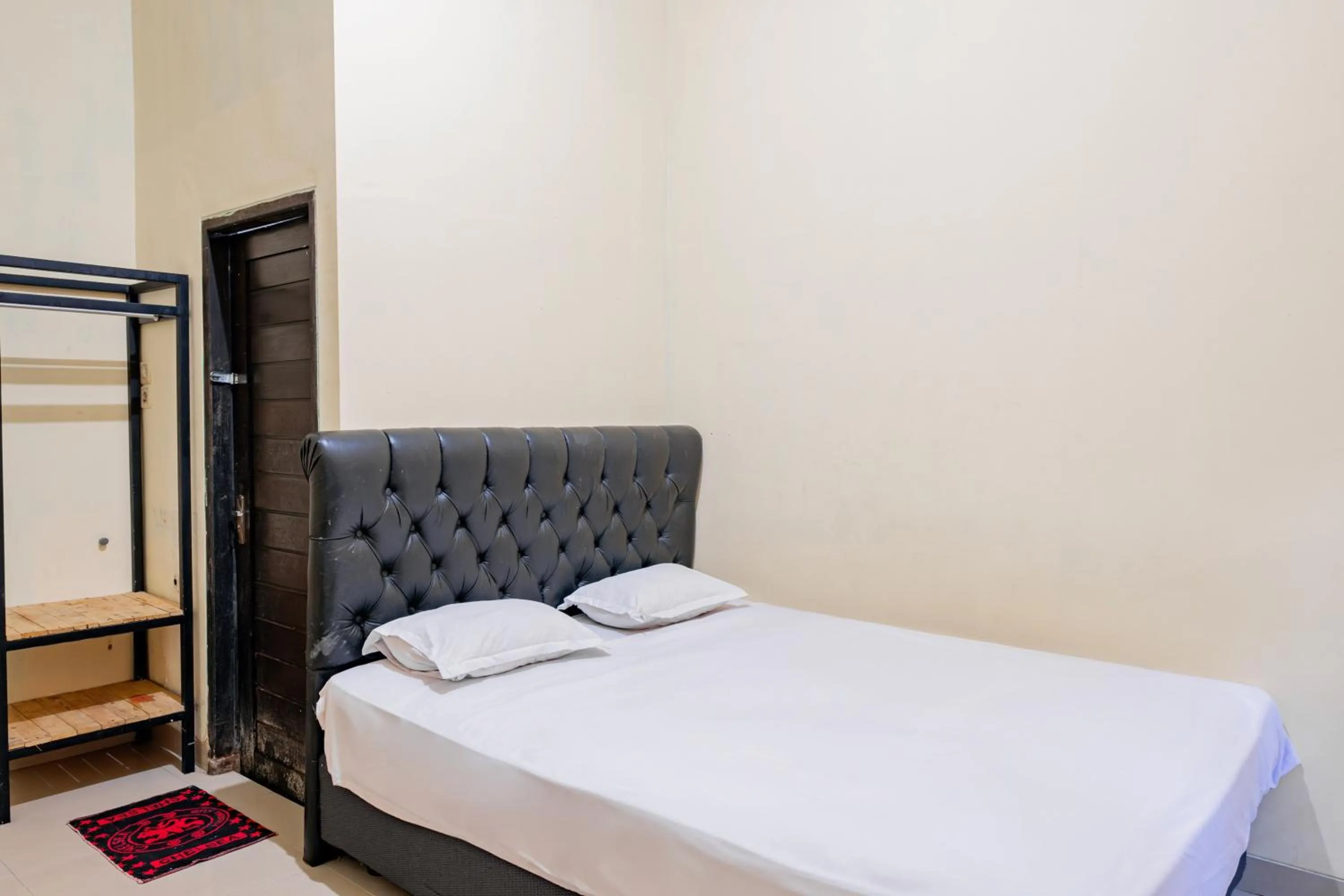 Bedroom in Hotel O Rinjani Guest House