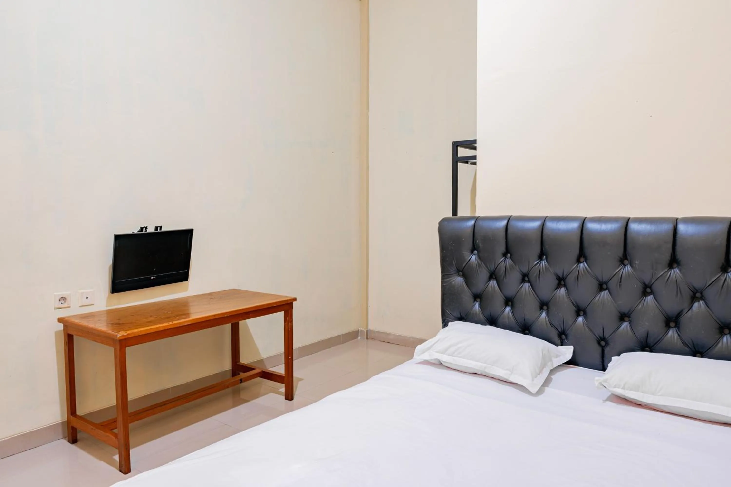 Bedroom in Hotel O Rinjani Guest House