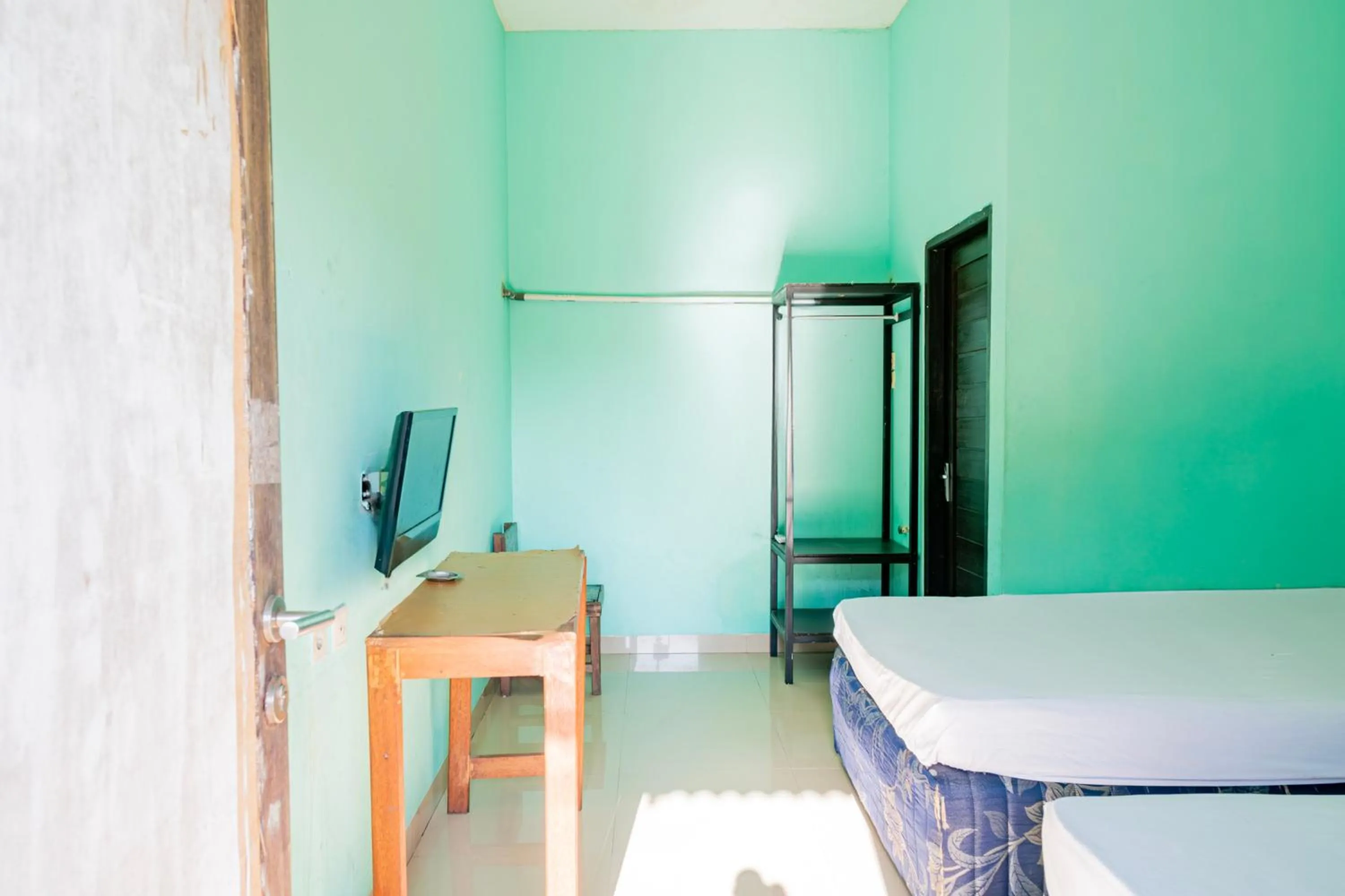 Bedroom in Hotel O Rinjani Guest House