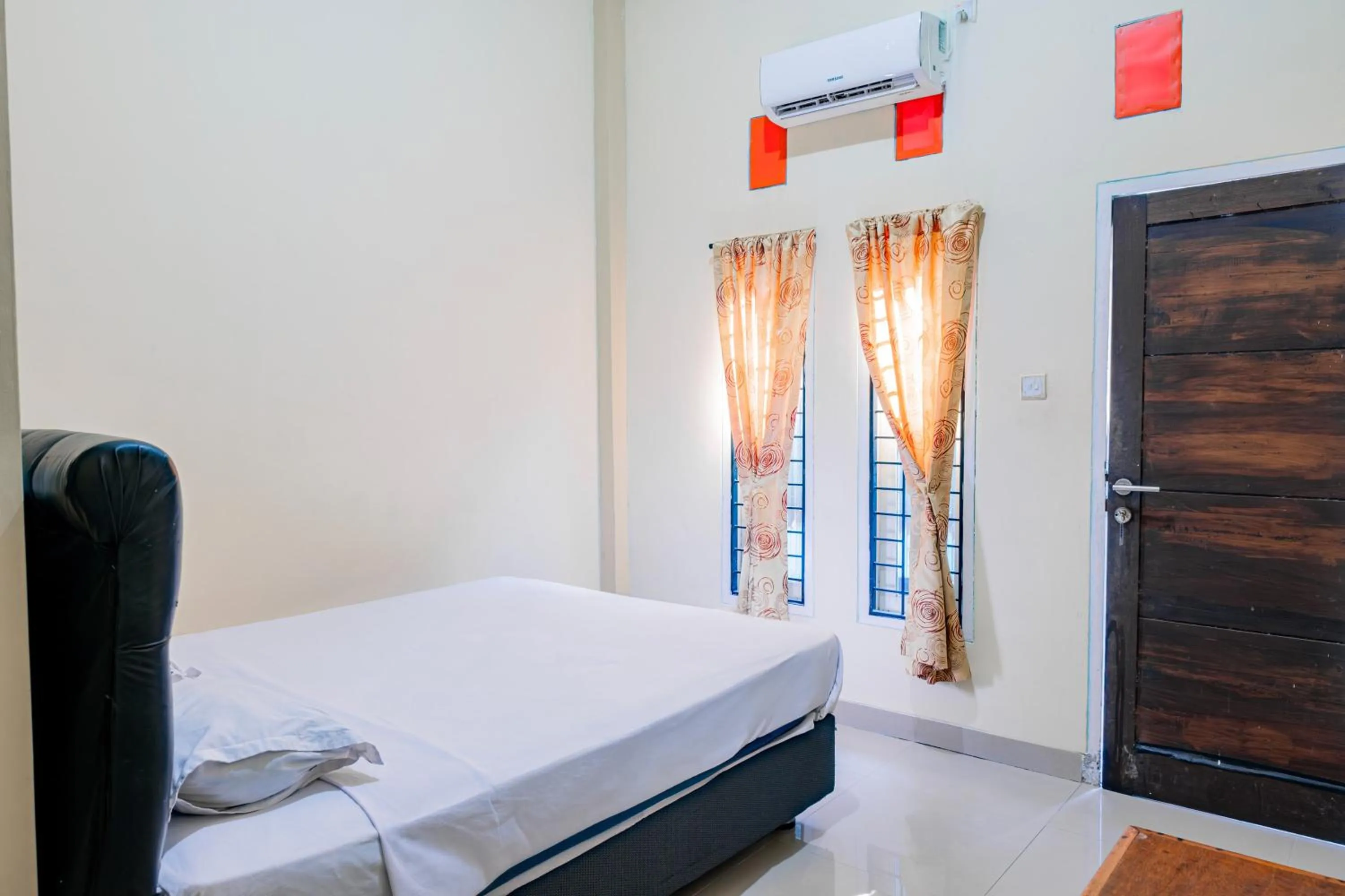 Bedroom in Hotel O Rinjani Guest House