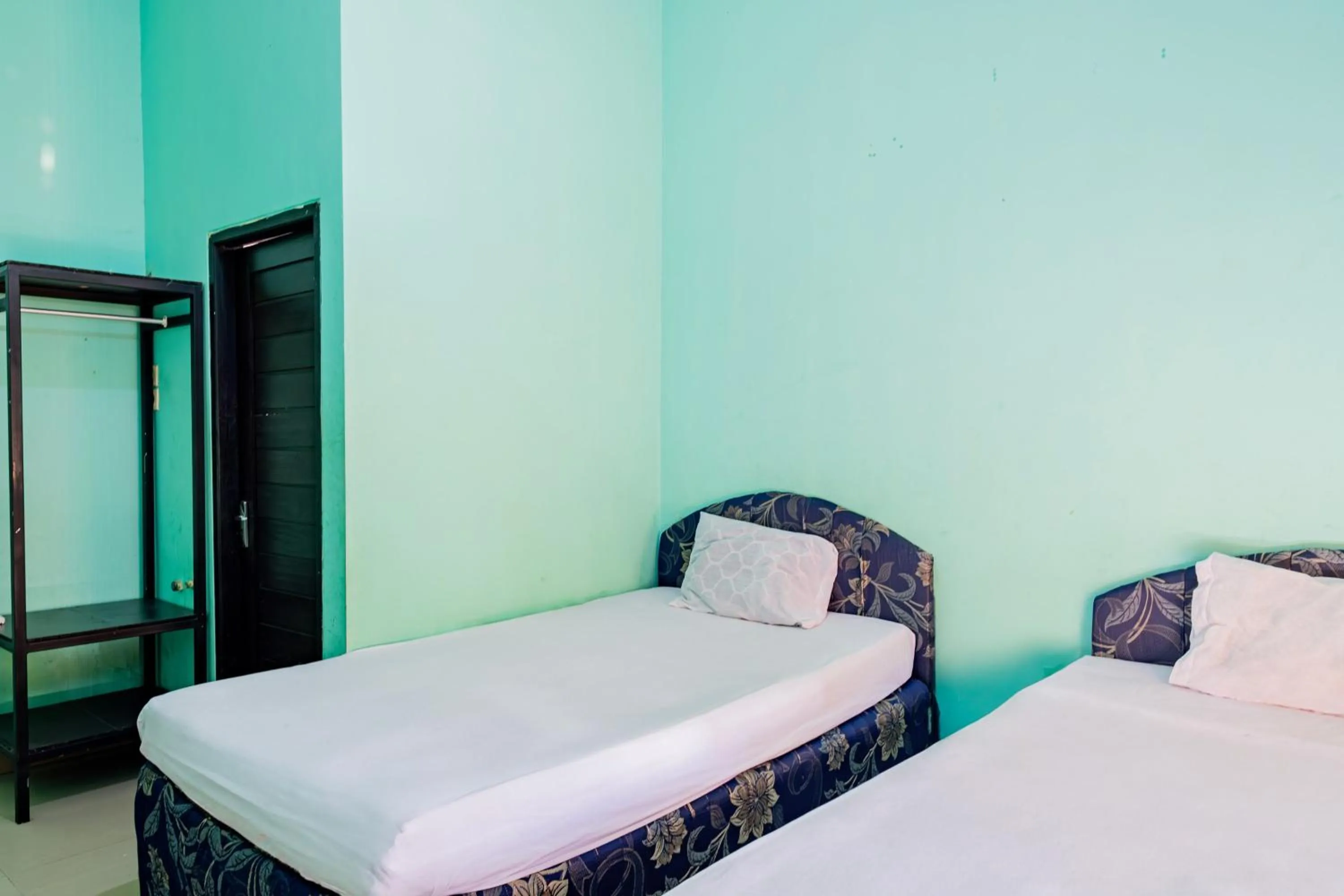 Bedroom in Hotel O Rinjani Guest House