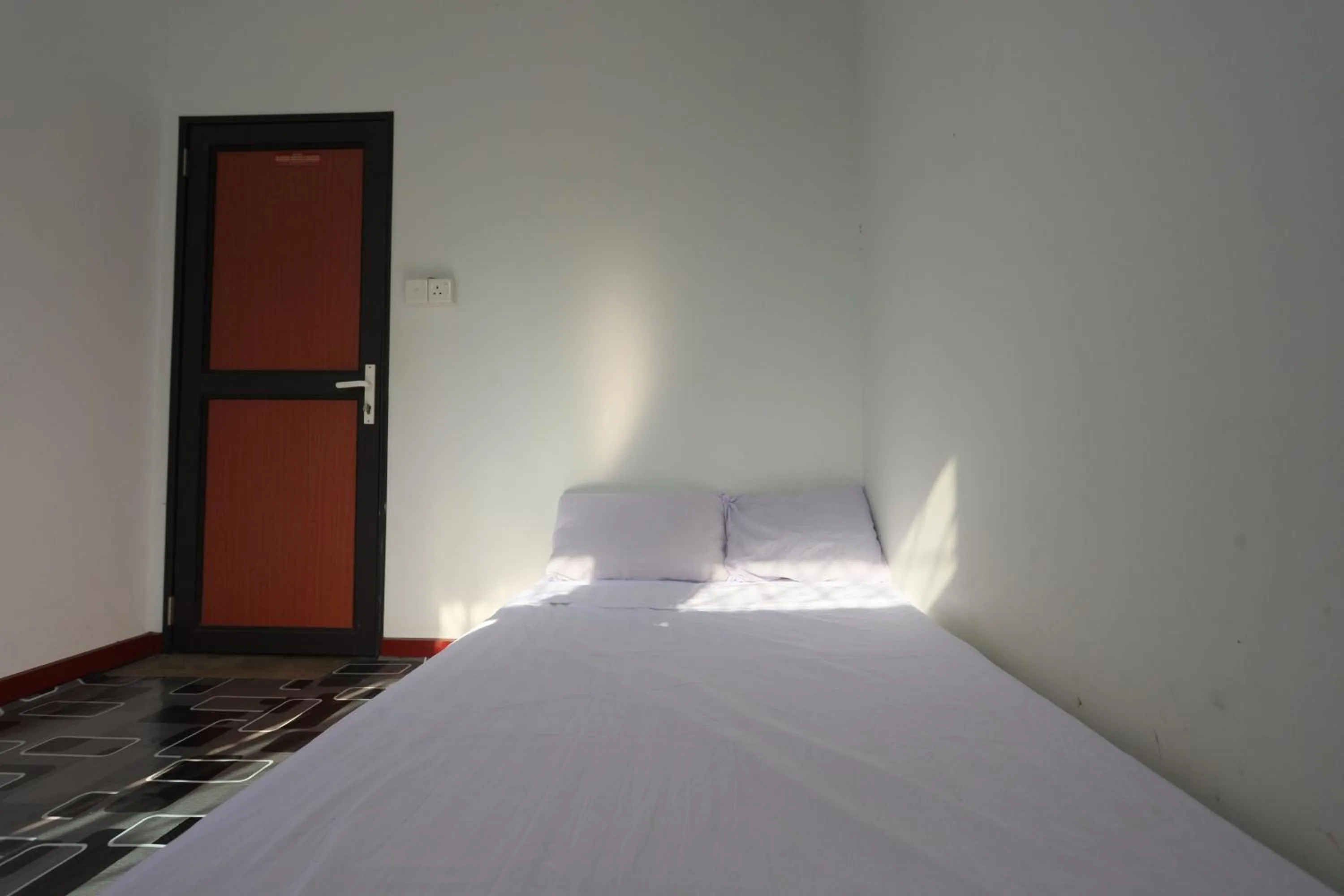 Bedroom in Hotel O Homestay OrangeNearNagoya Hill Shopping Mall