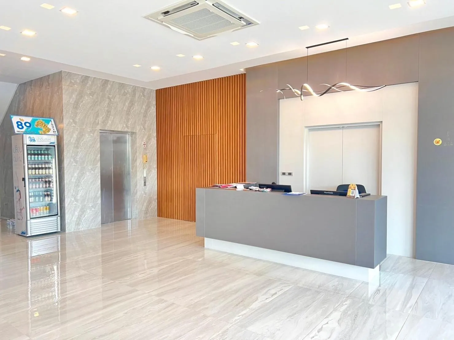 Lobby or reception in JIA HAUS Hotel Apartment