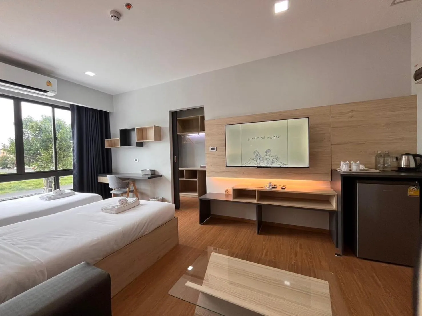 Bed in JIA HAUS Hotel Apartment