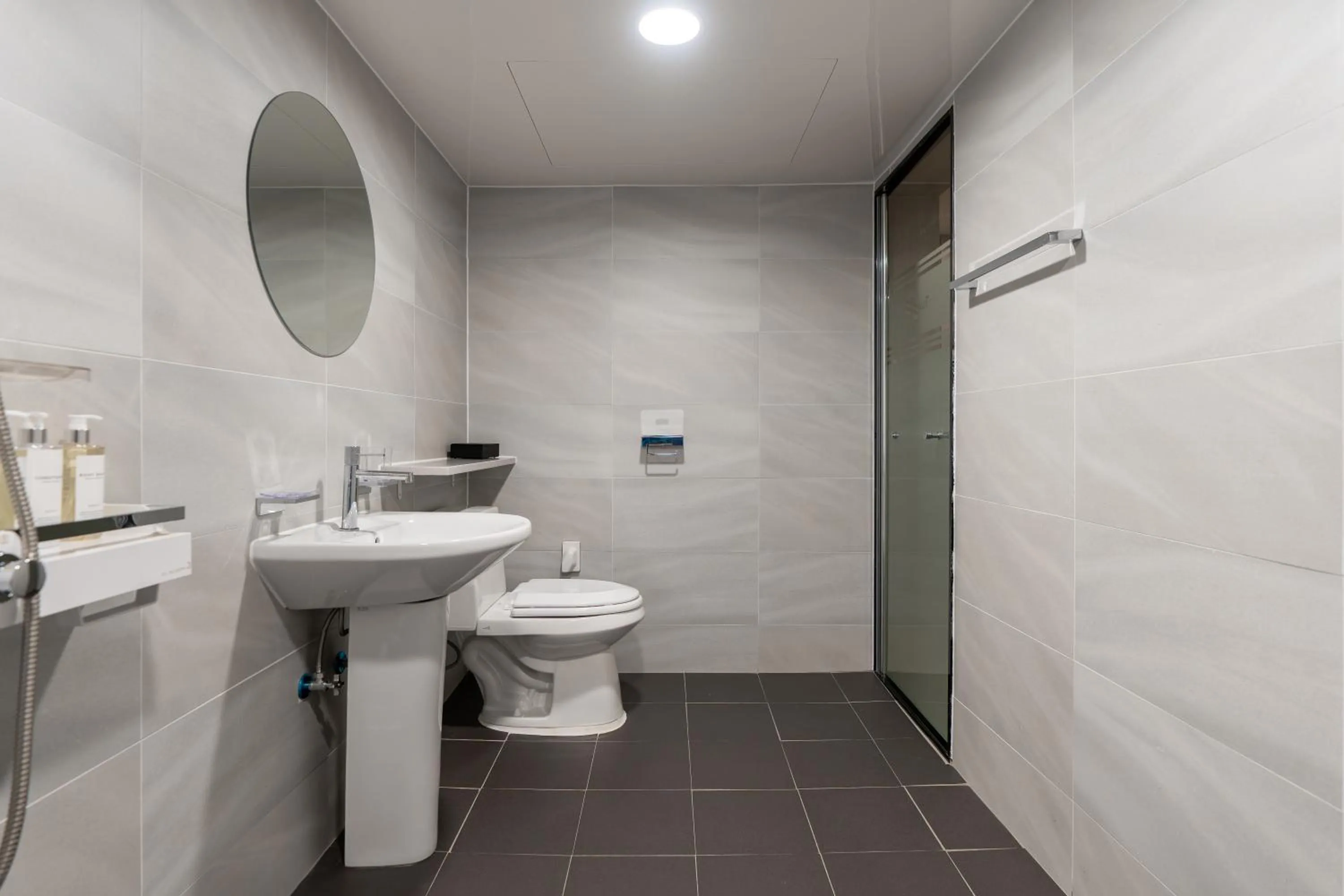 Toilet in Two H Hotel