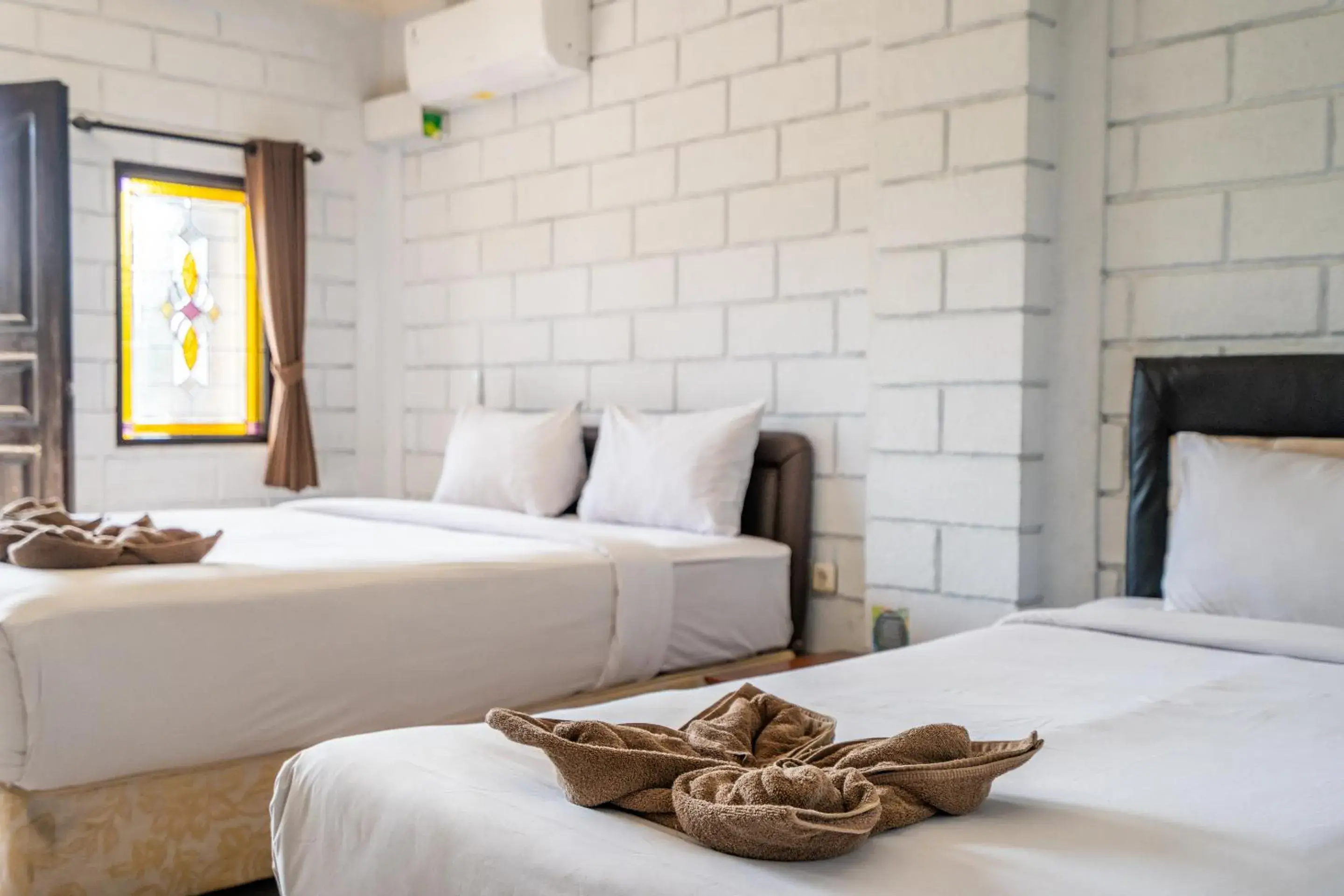 Junior Suite with Balcony in Ammara Legian By Vilarisi Junior Suite with Balcony in Ammara Legian By Vilarisi