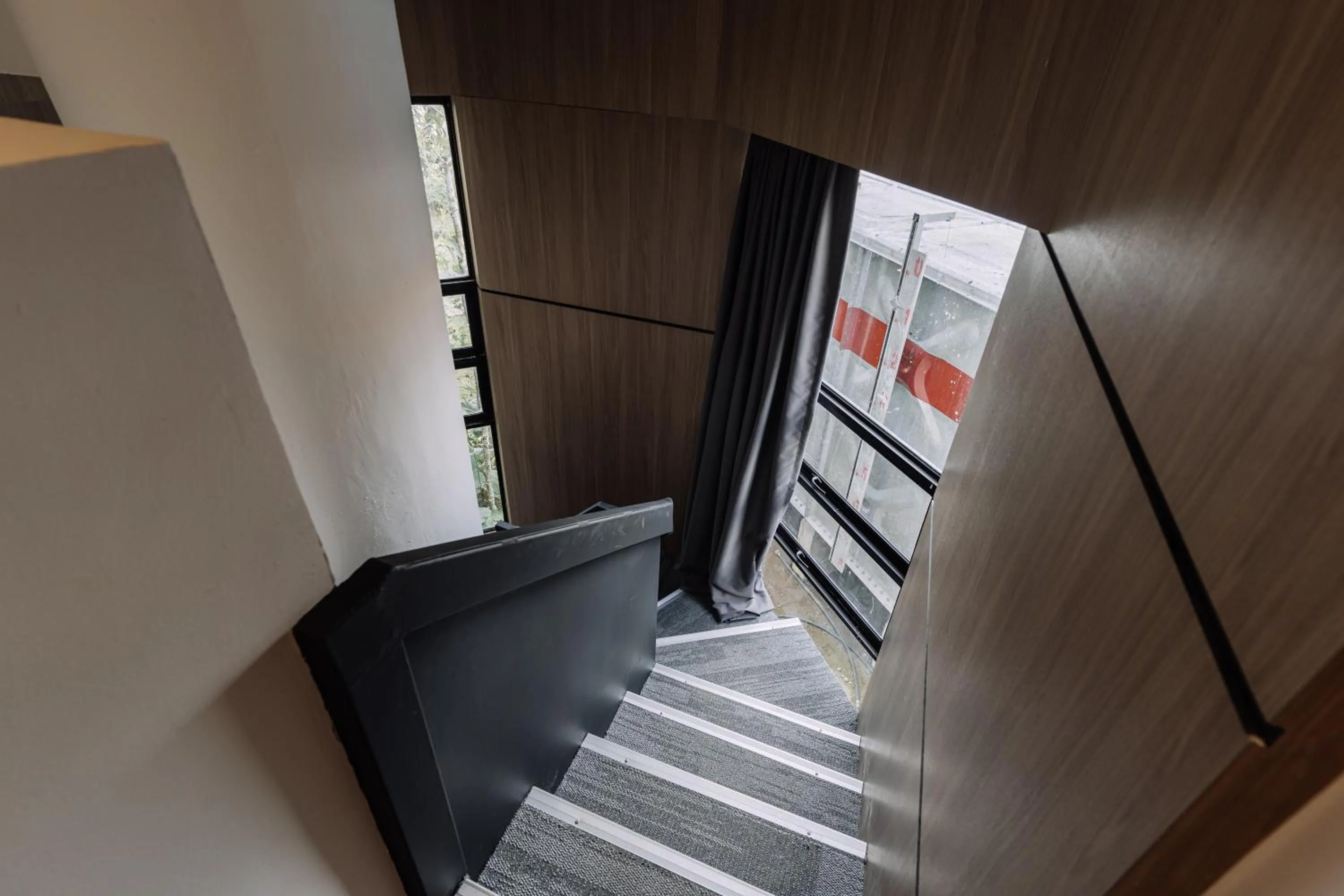 Bedroom in Impiana by Roxy Hotel