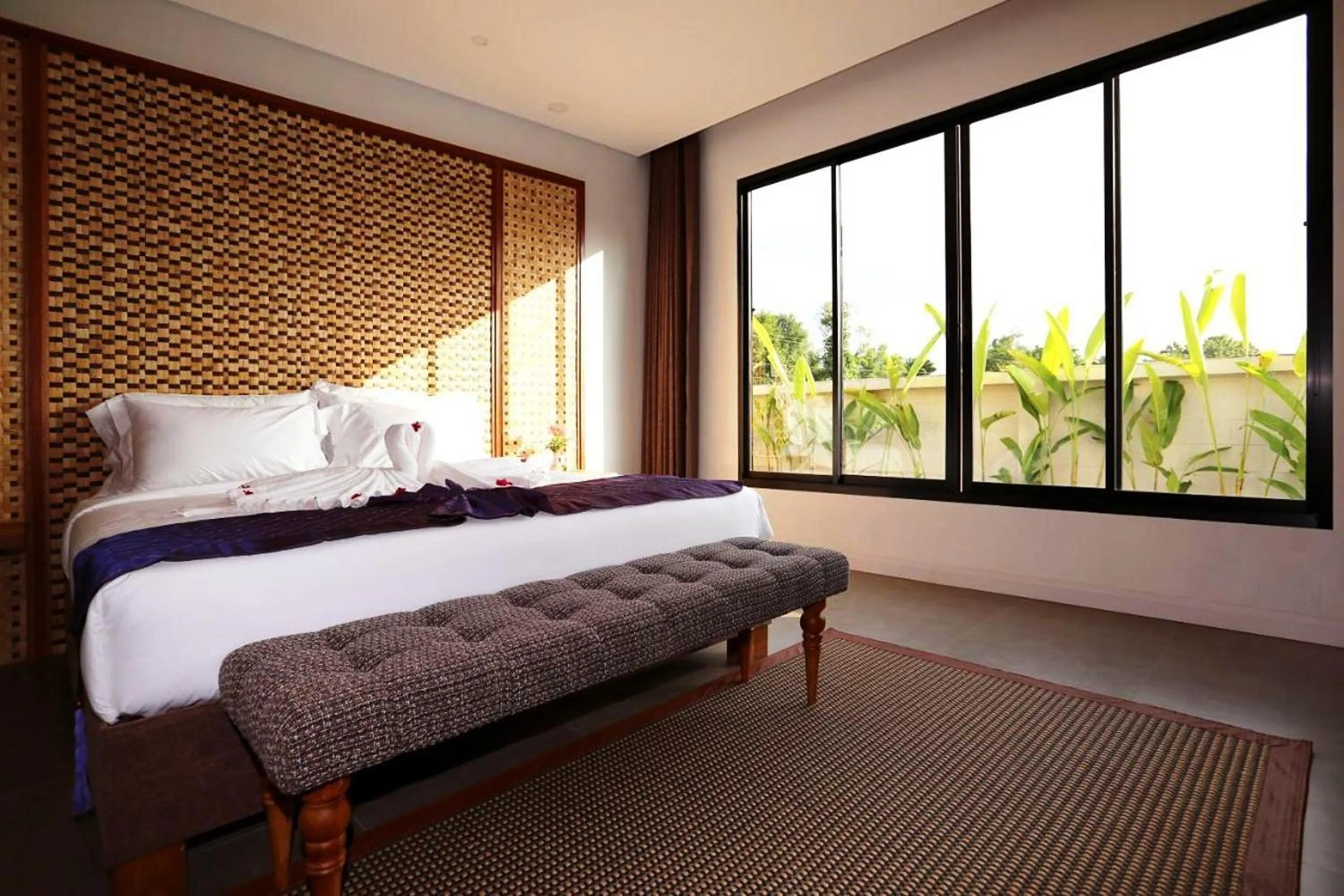 Bed in Thai Good Arts Resort