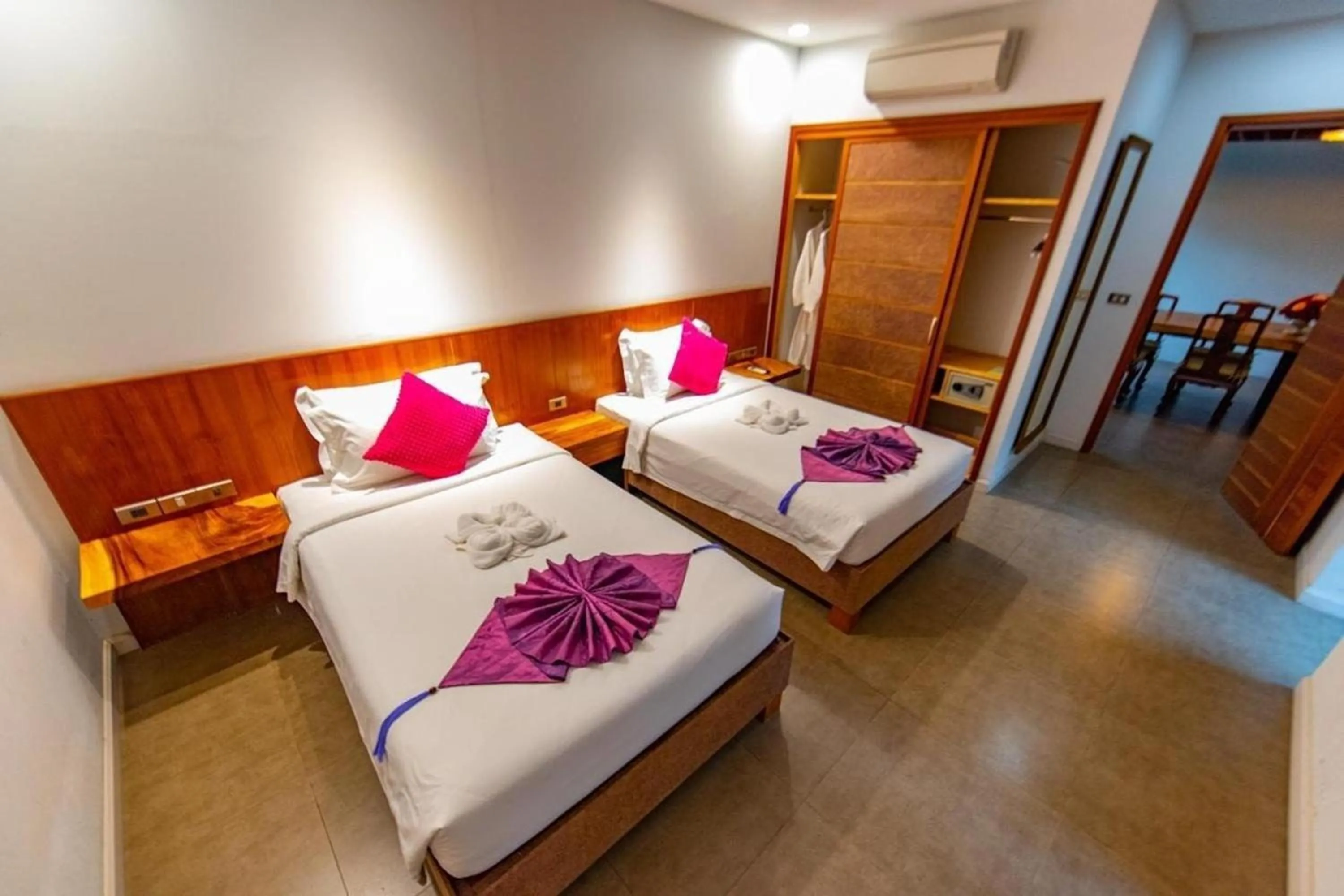 Bed in Thai Good Arts Resort