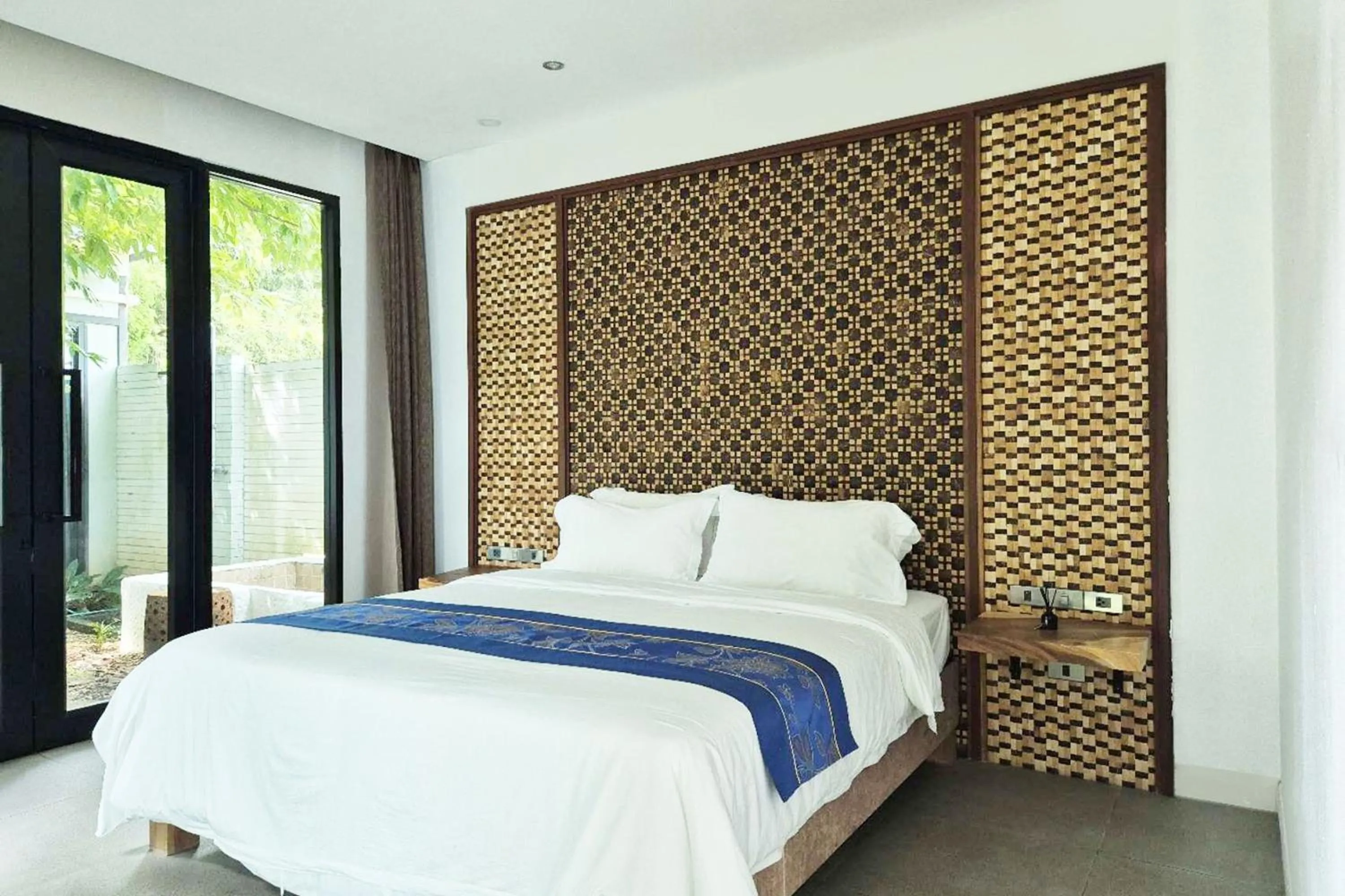 Bed in Thai Good Arts Resort