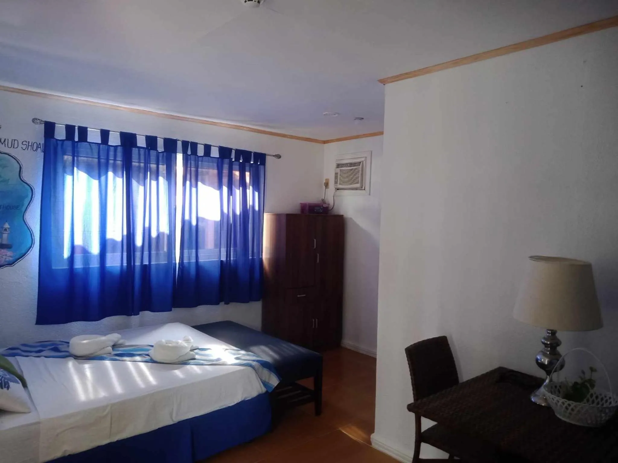 Photo of the whole room, Bed in Malapascua Beach and Dive Resort