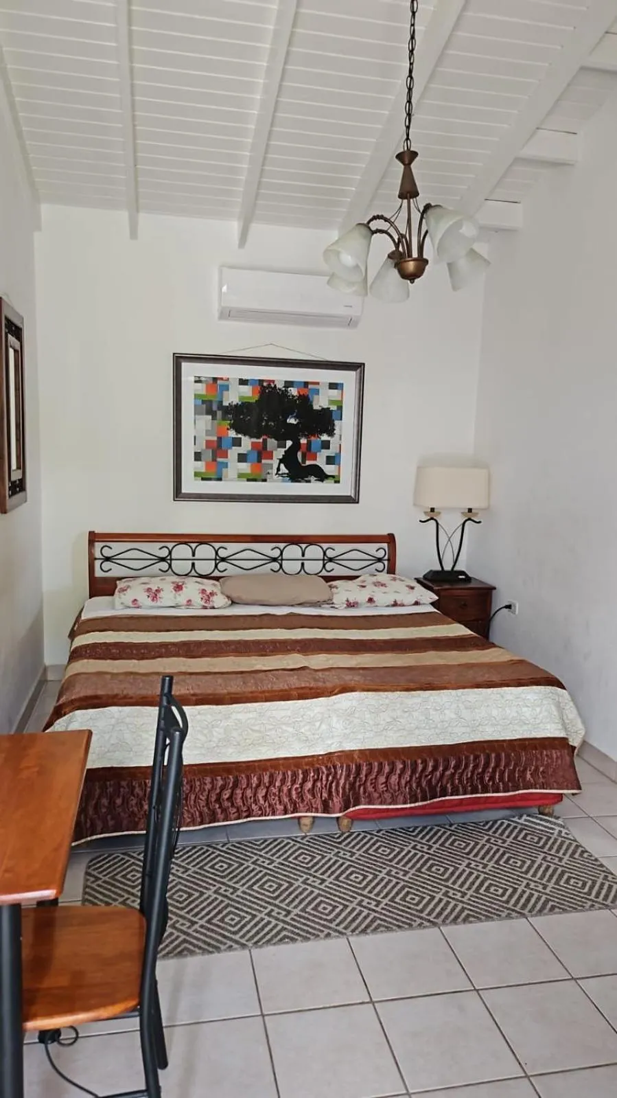 Photo of the whole room, Bed in YOUR FIRST DAY Hotel on Aruba